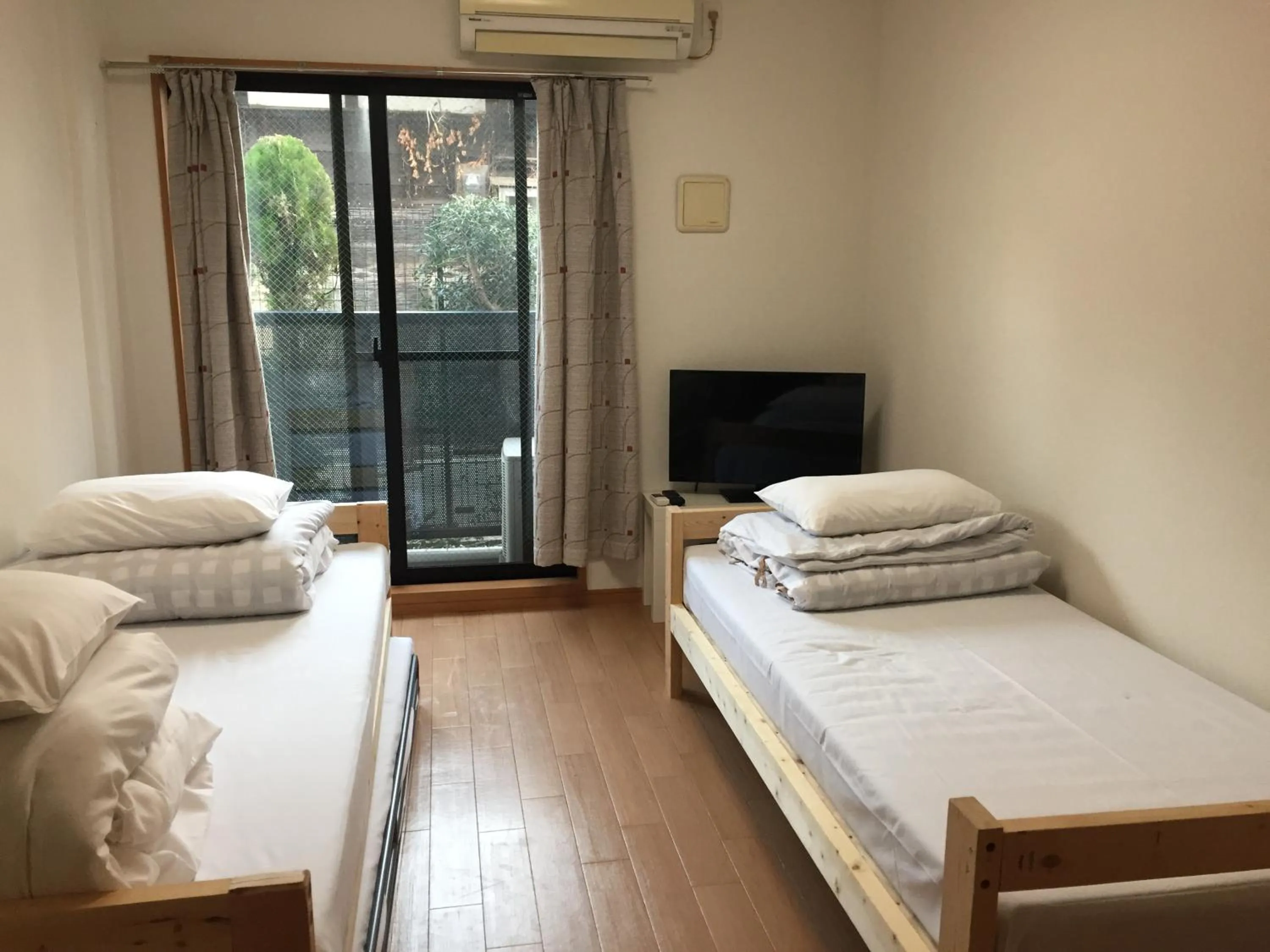 Bed in Sophiearth Apartment