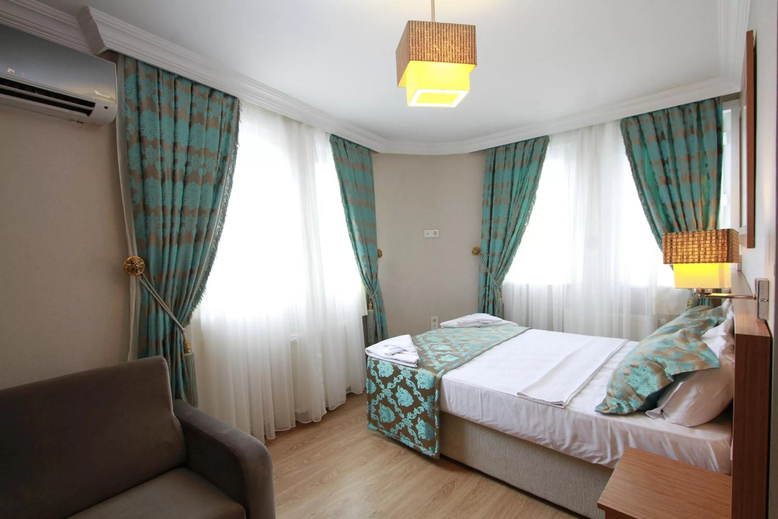 Bedroom, Bed in Agora Boutique Hotel & Bistro