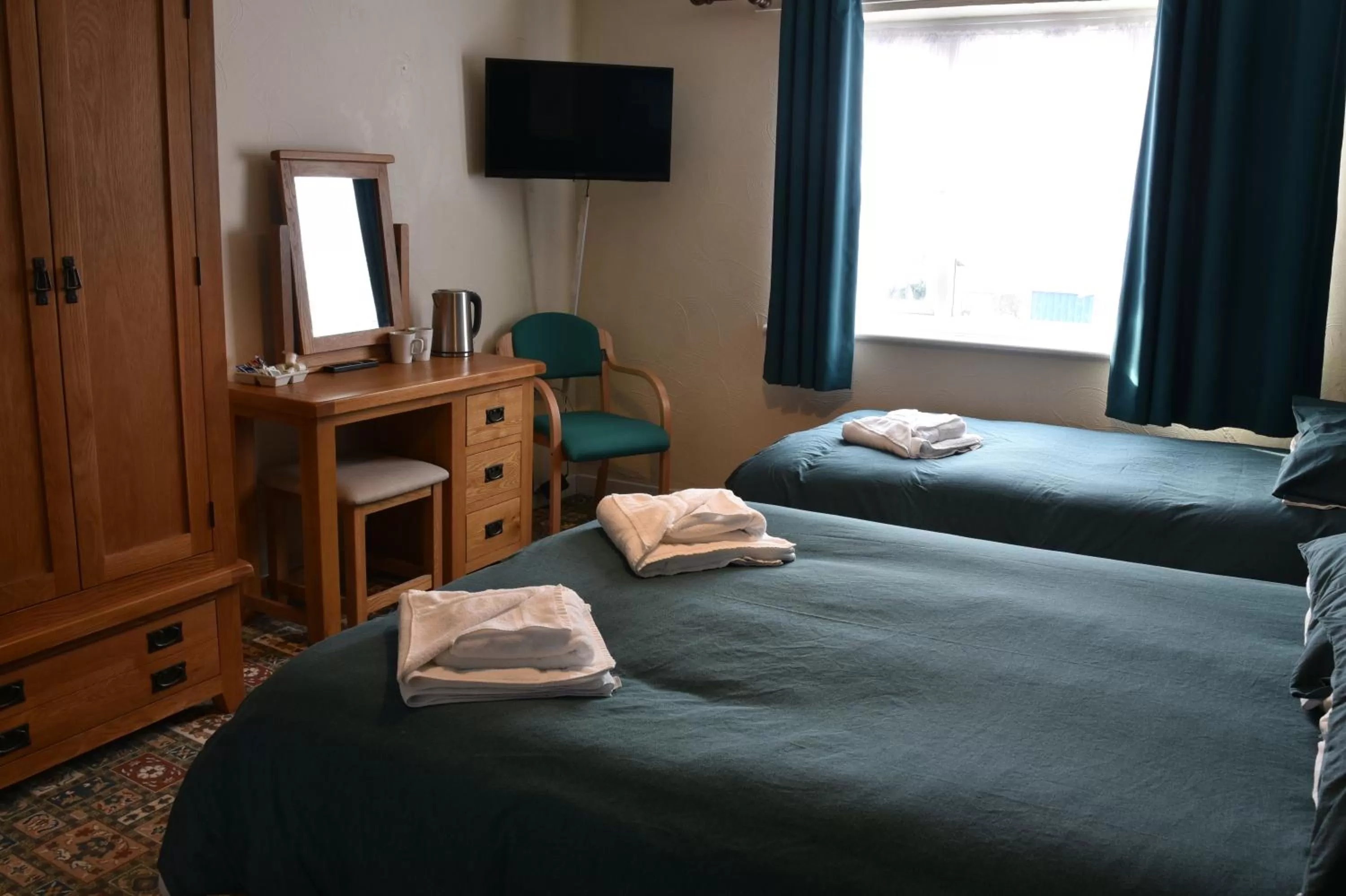 Bed in Dinorben Arms Hotel