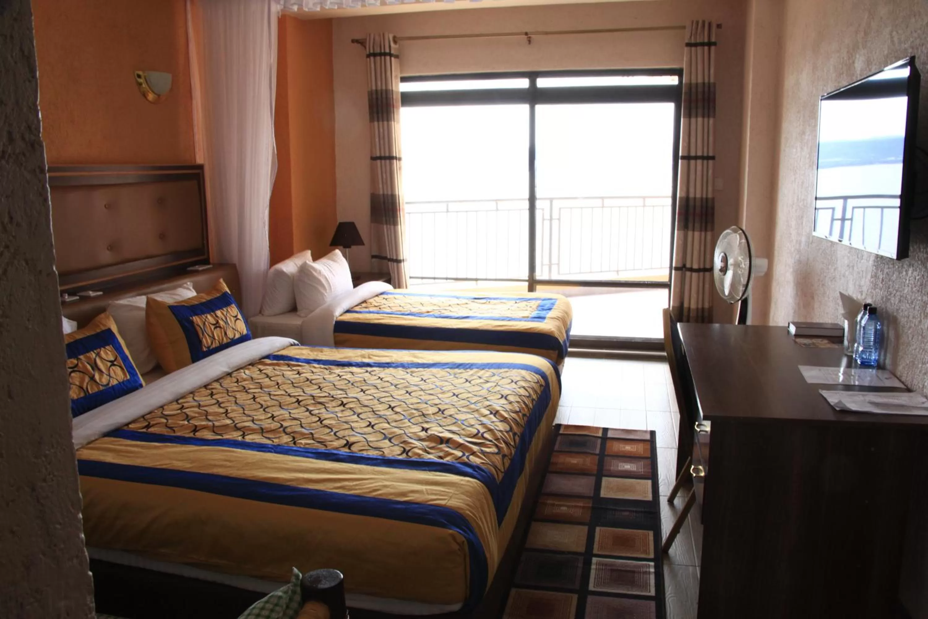 Bed in Milimani Beach Resort