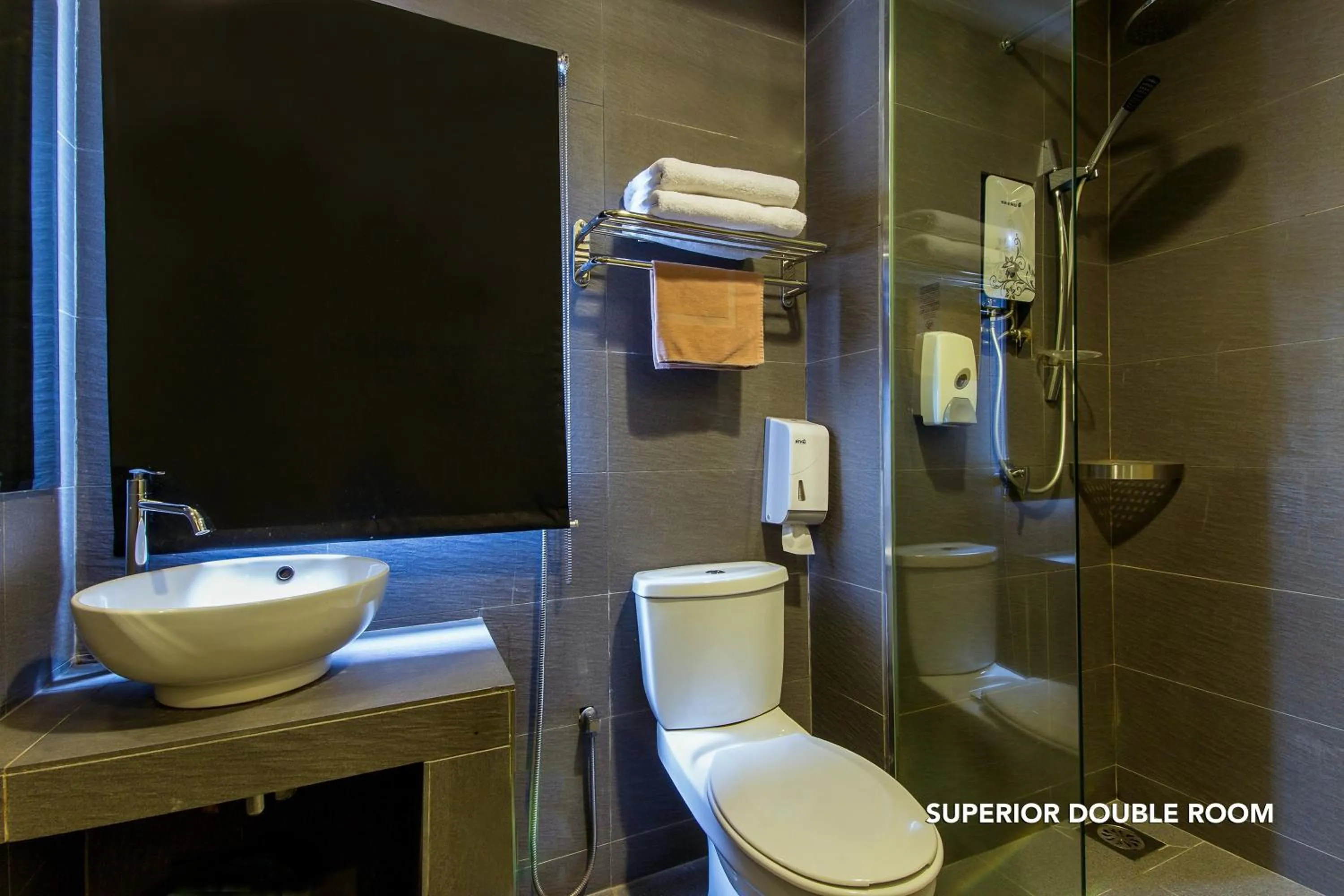 Bathroom in Ceria Hotel