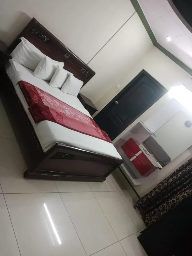 Bed in Hotel Grace inn