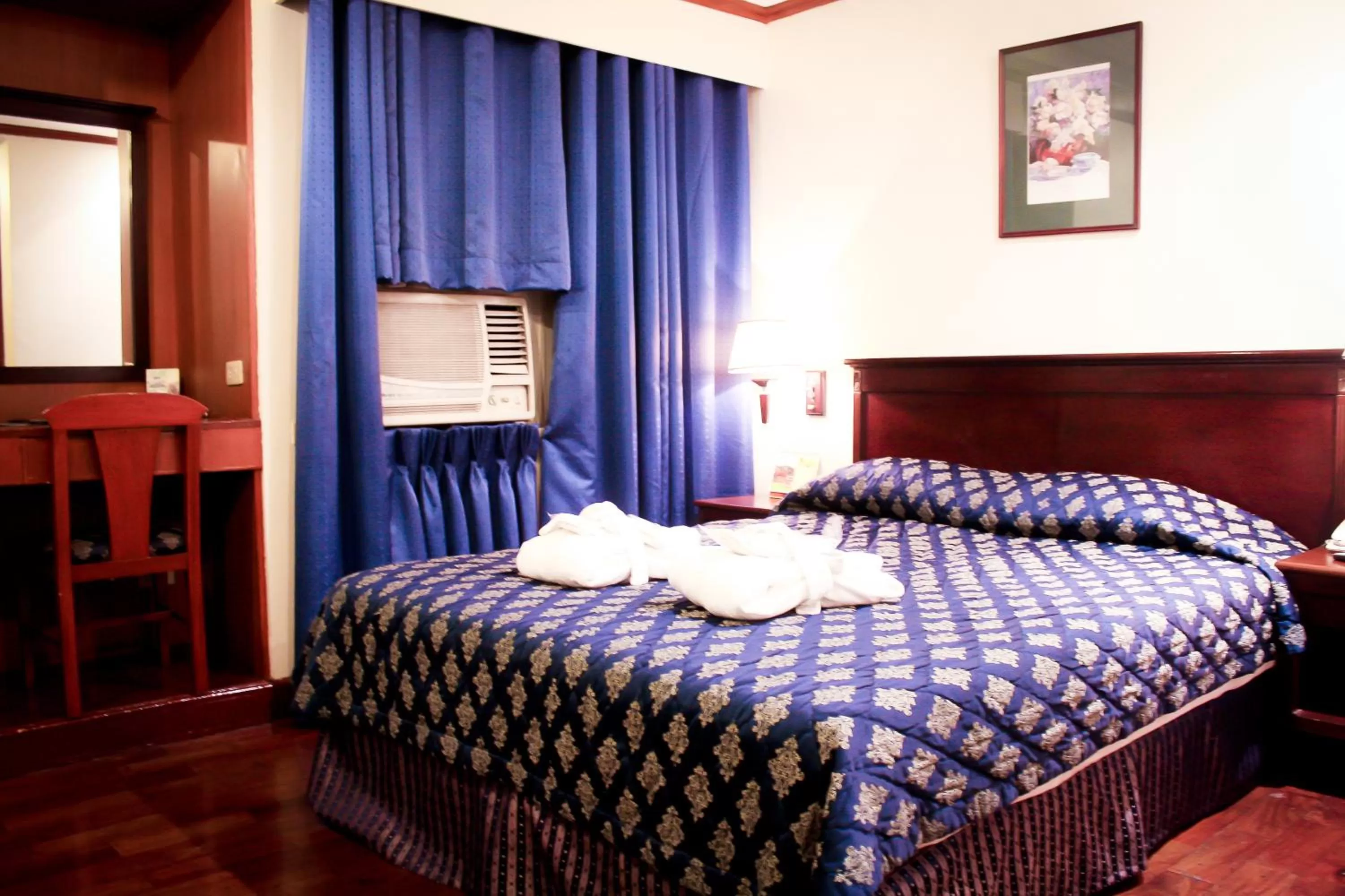 Bed in CityState Tower Hotel