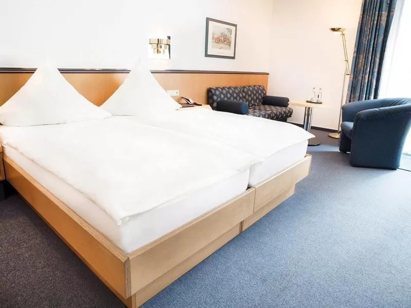 Bed in Hennedamm Hotel
