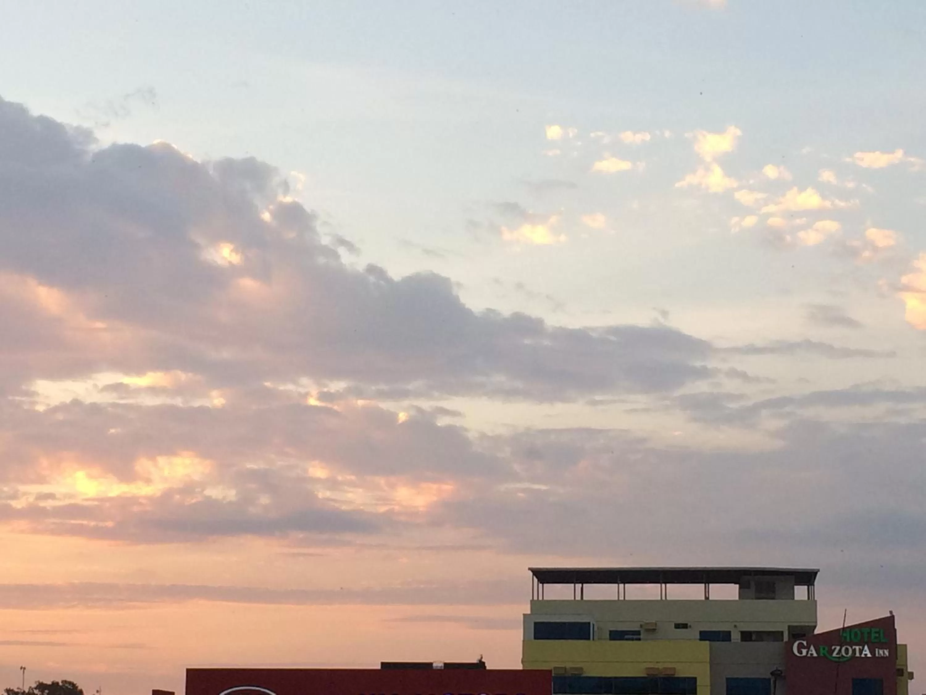 Property logo or sign in Hotel Garzota Inn