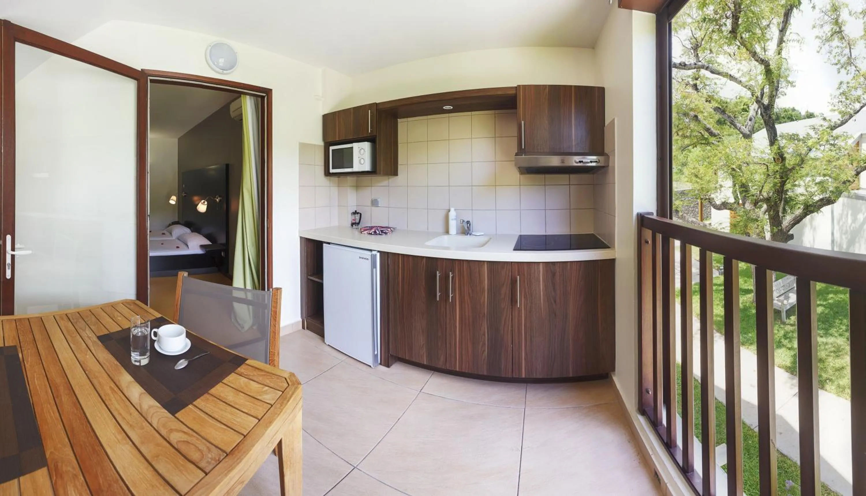 Kitchen or kitchenette in Tama Hotel