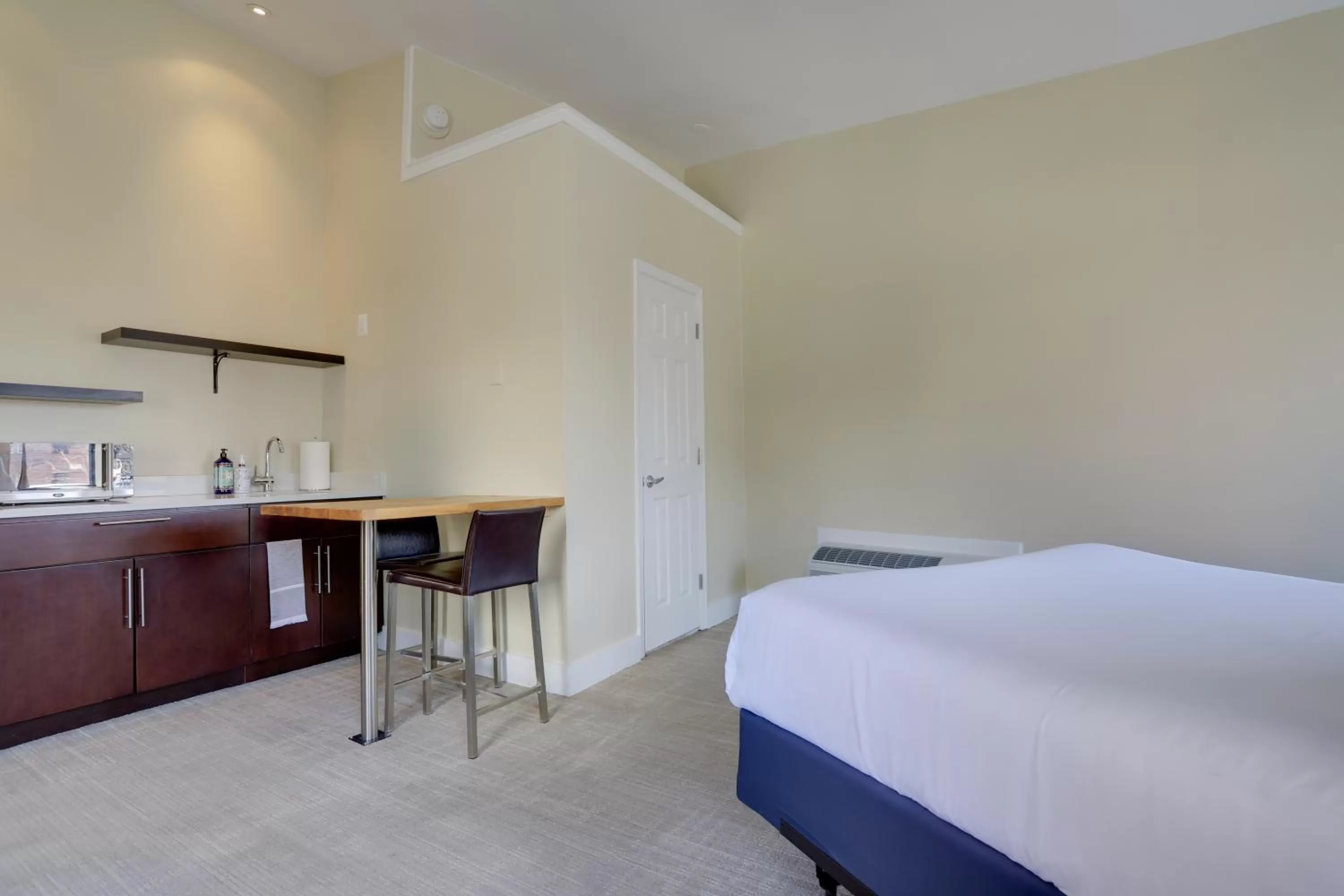 Bed in Sojourn at DuPont Place