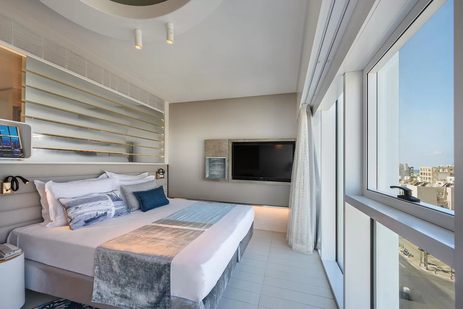 Photo of the whole room, Bed in Port Tower by Isrotel Design