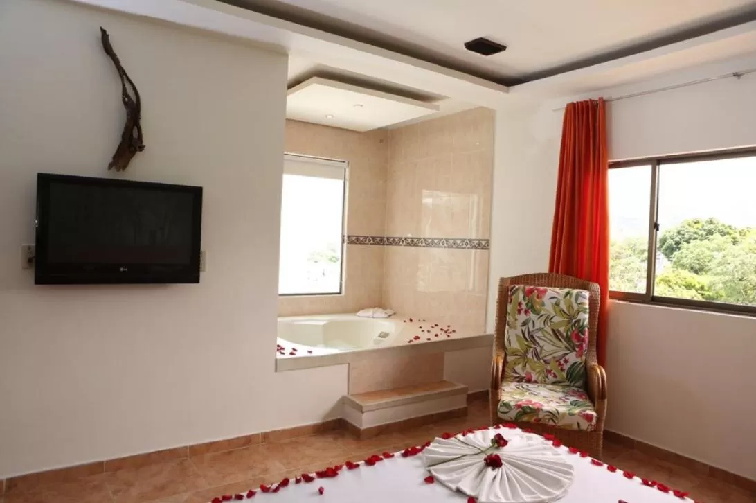 Bath, TV/Entertainment Center in Hotel Anamichu Suites