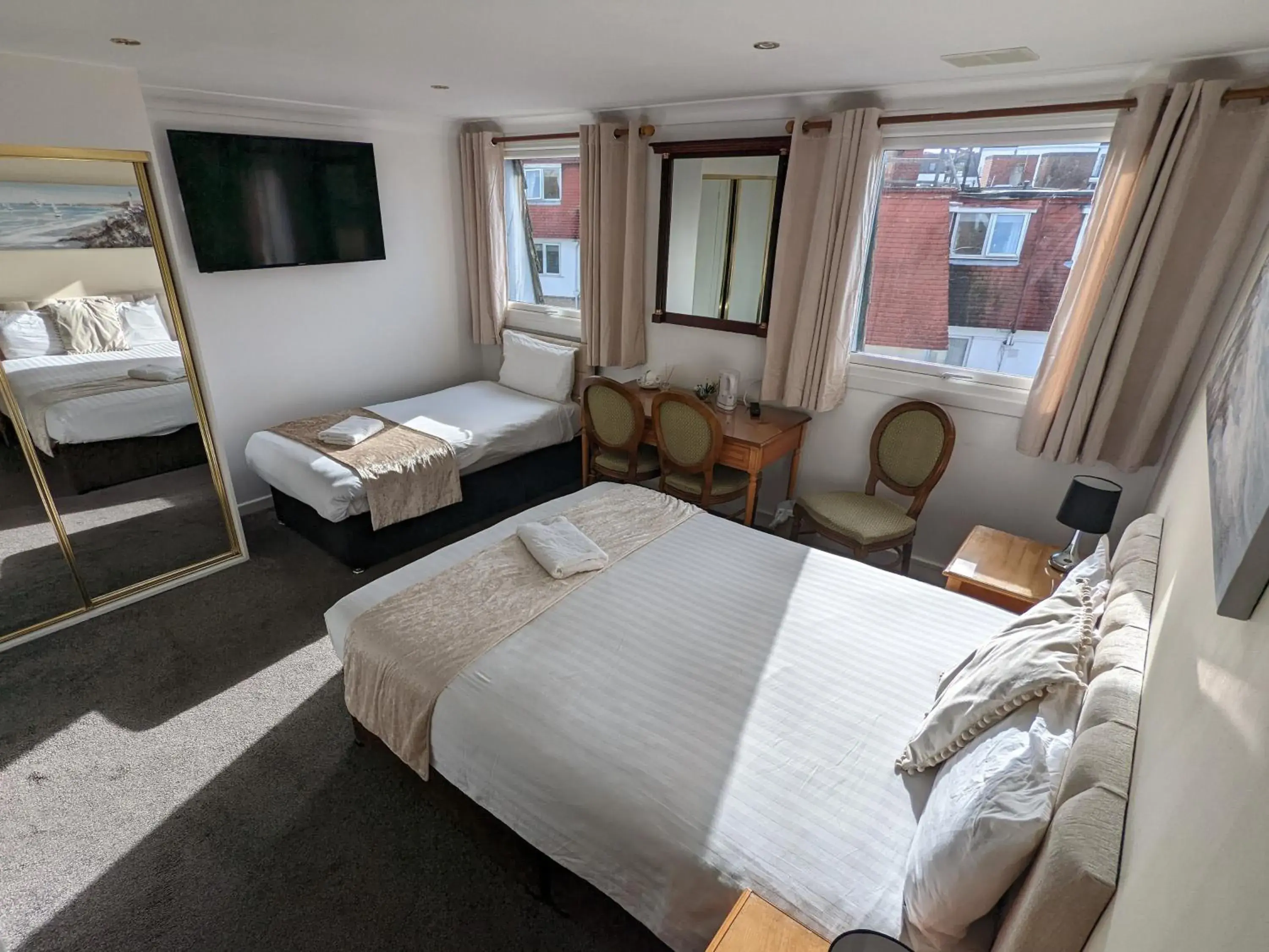 Family Room (3 Adults) in Cecil Court Hotel Family Room (3 Adults) in Cecil Court Hotel