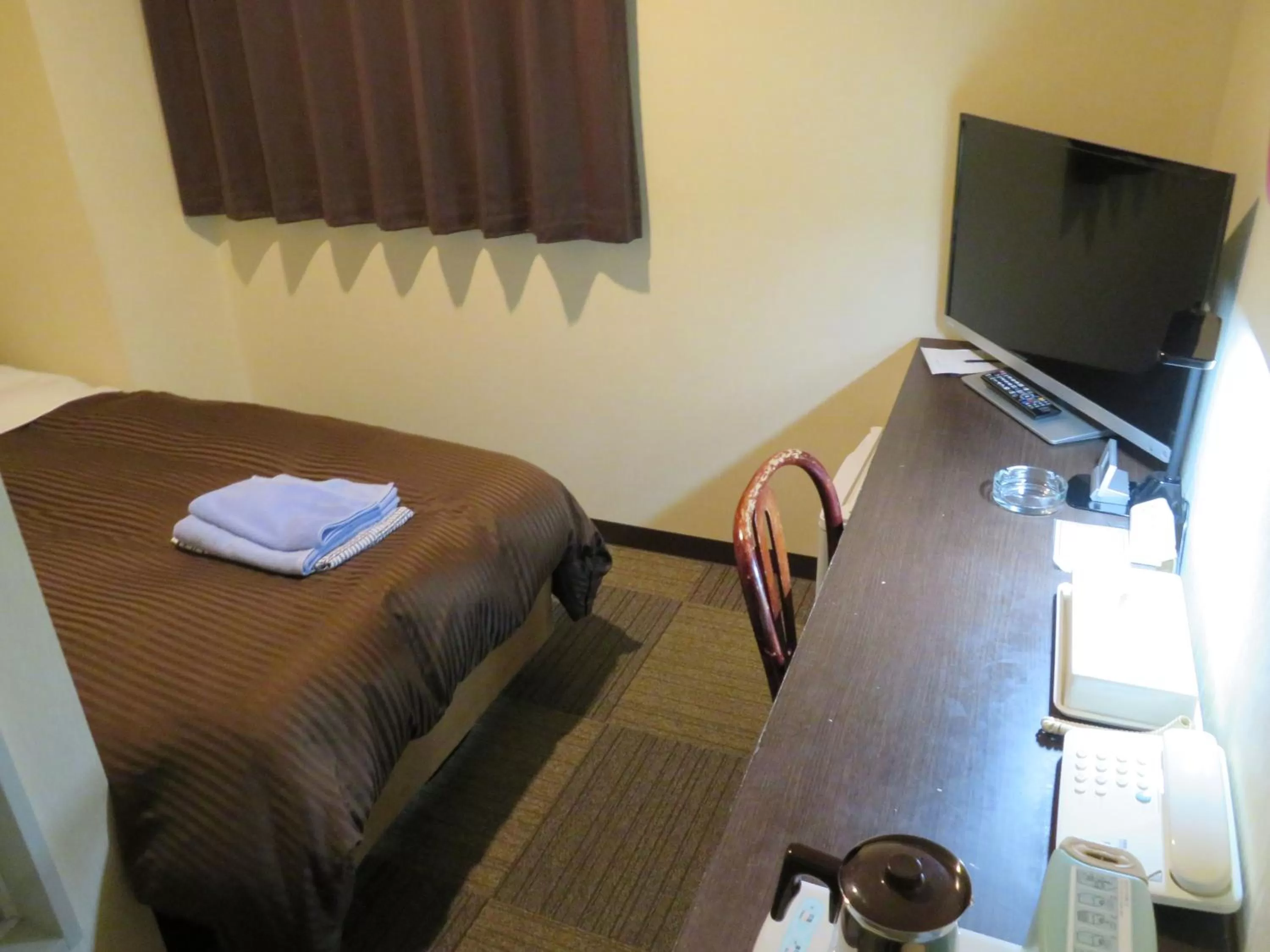 Bed in 釜石駅から徒歩5分ホテルマルエHotelMarue