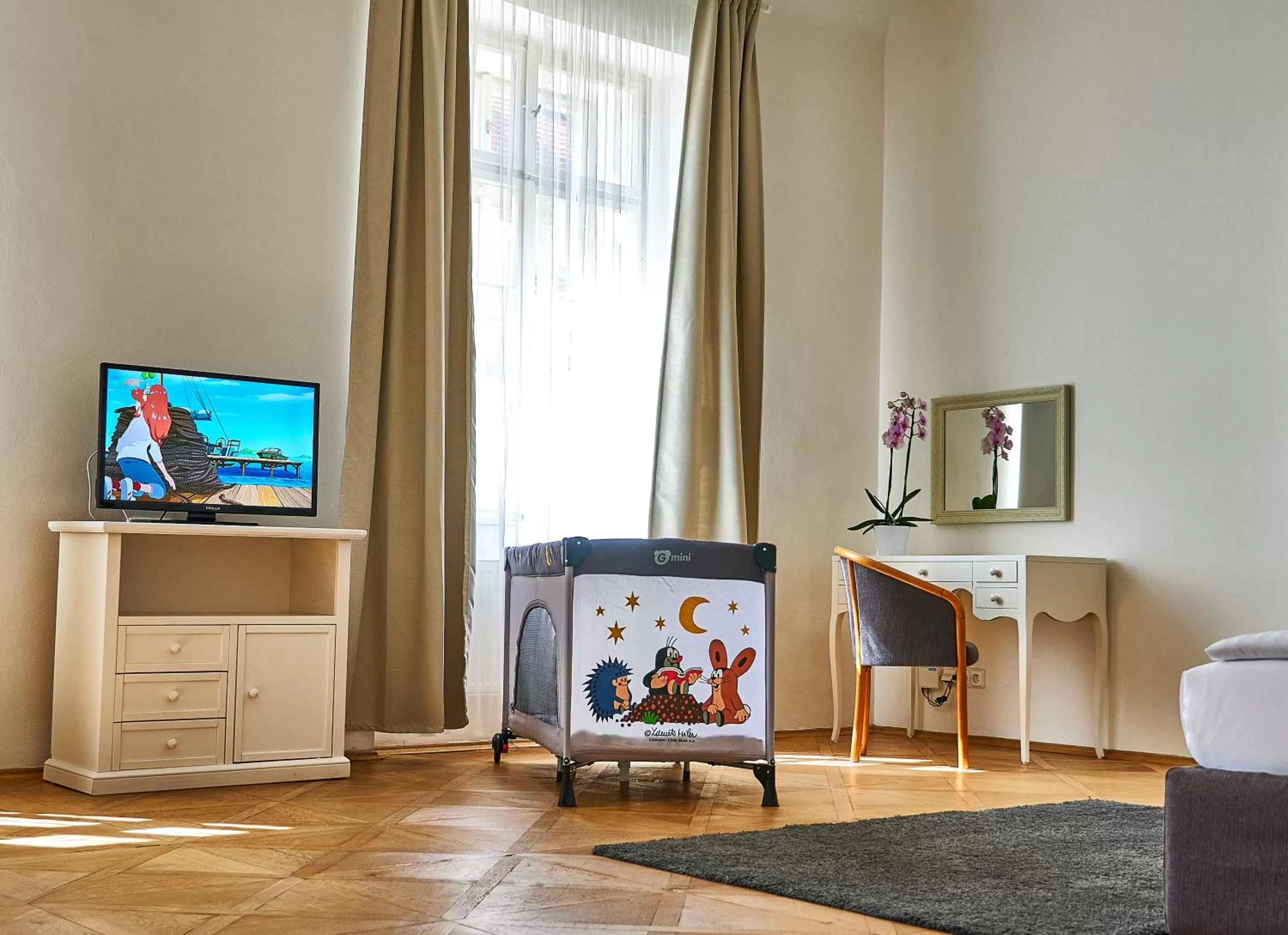 Bed in Three Golden Crowns Apartments