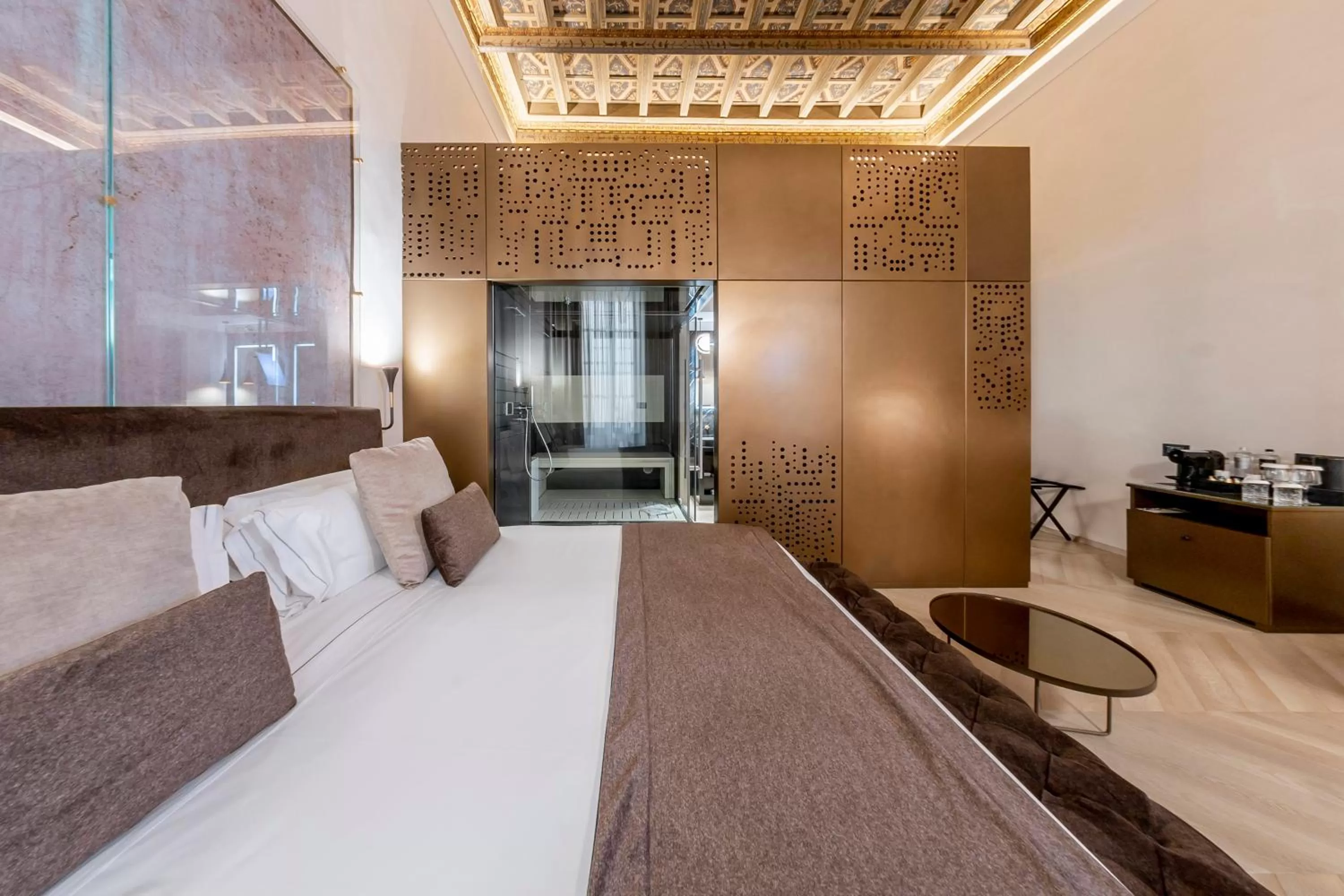 Bed in Martius Private Suites Hotel