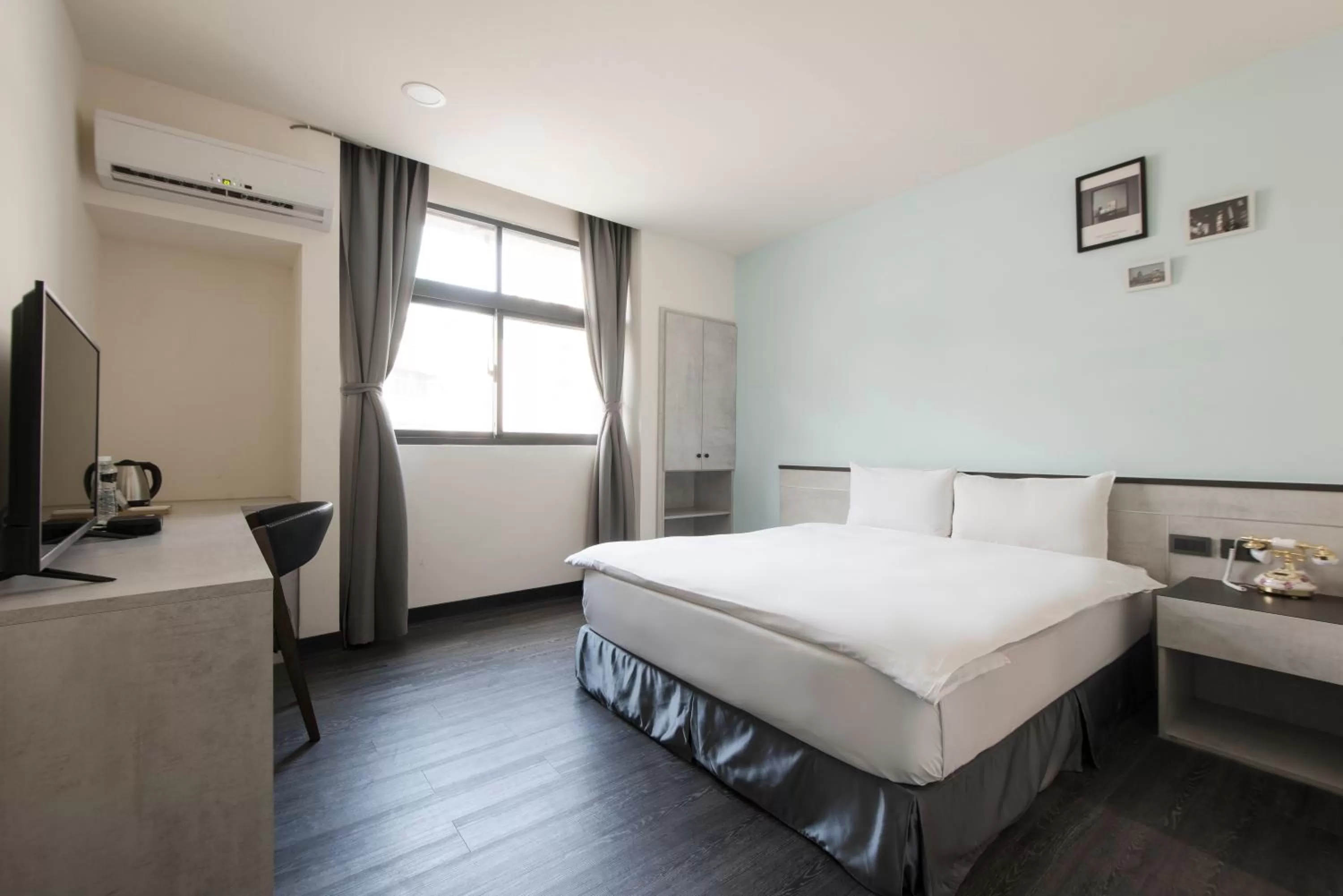 Bed in Raise Hotel Taichung