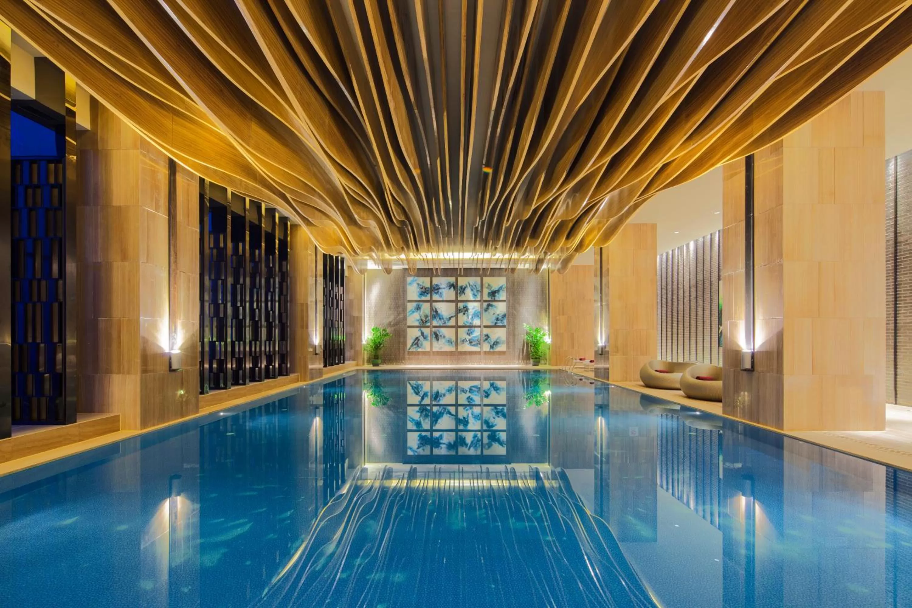 Swimming pool in Crowne Plaza Tianjin Meijiangnan by IHG