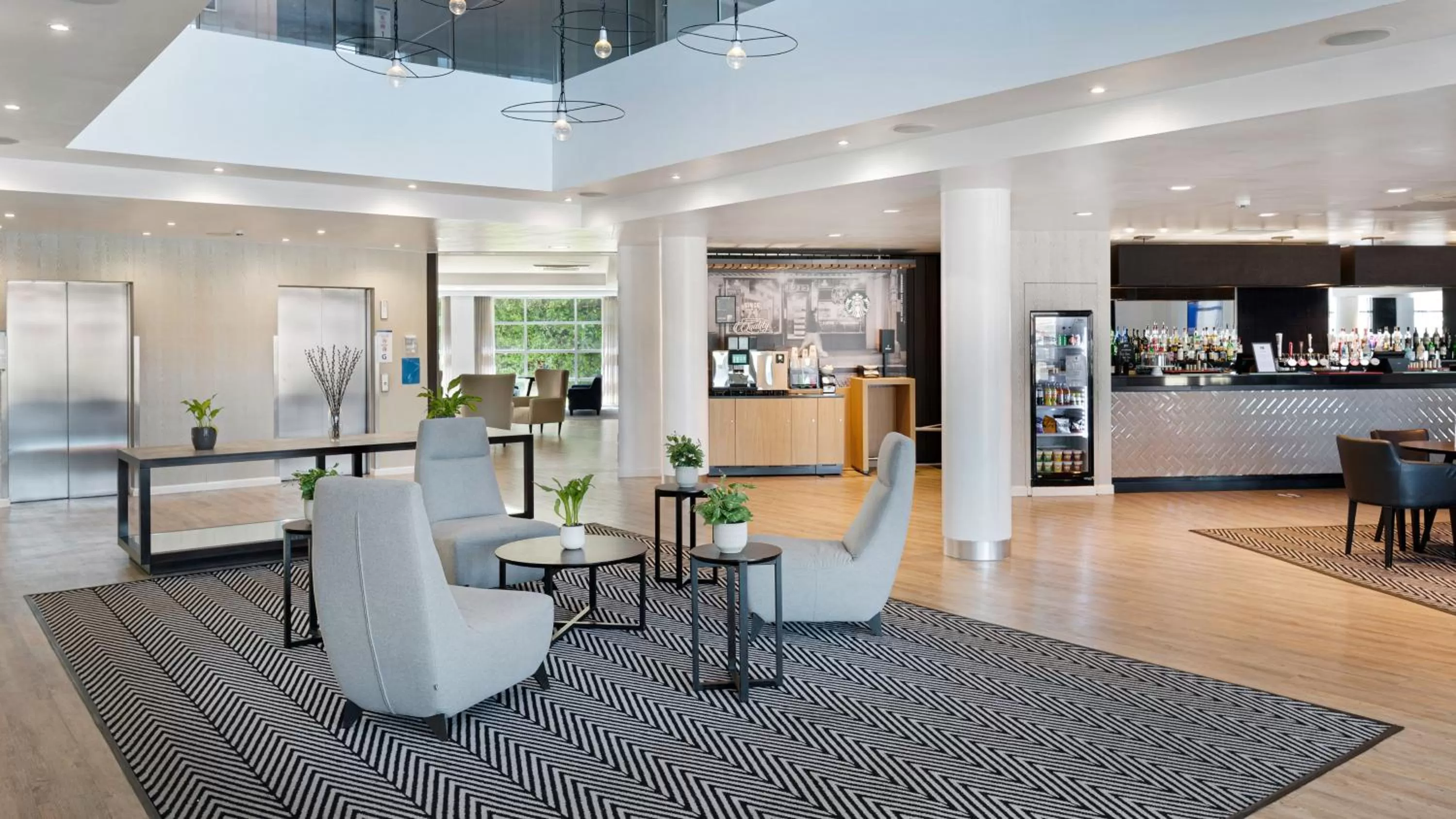 Lobby or reception in Holiday Inn Express Leigh - Sports Village by IHG