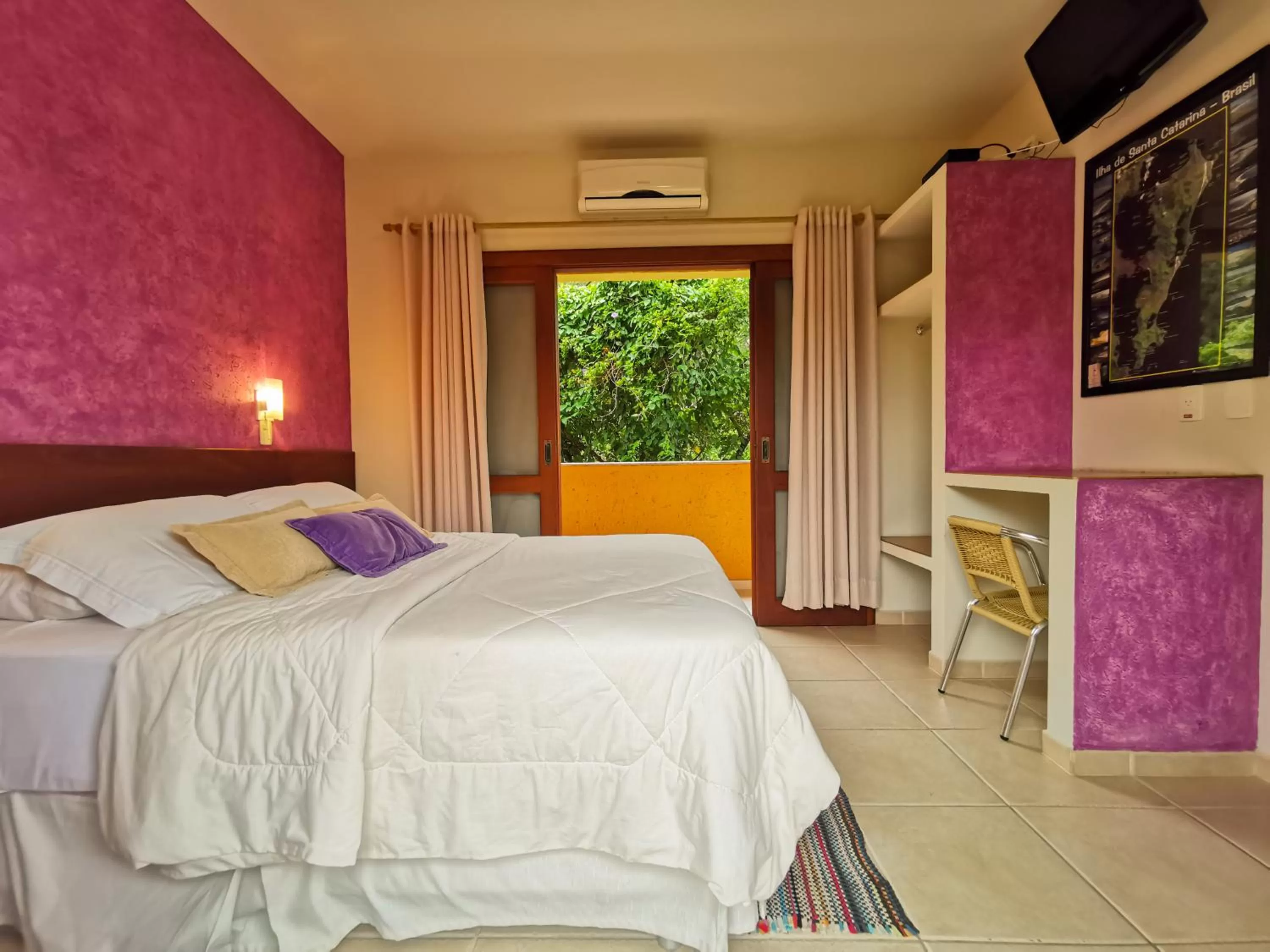 Bed in Pousada Ilha dos Anjos