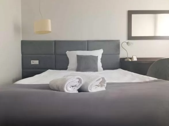 Bed in Hotel Maraton