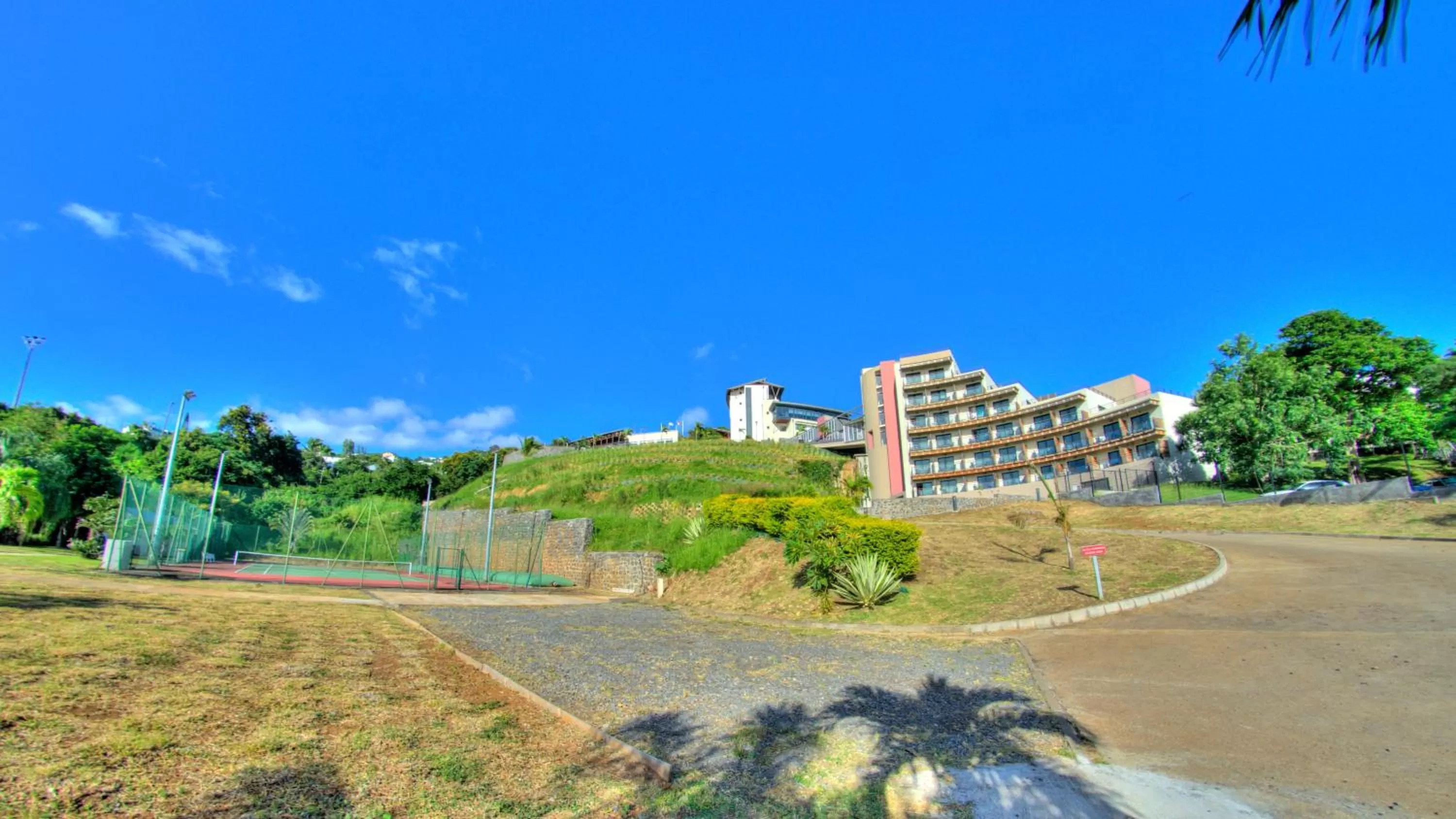 Tennis court, Property Building in Bellepierre