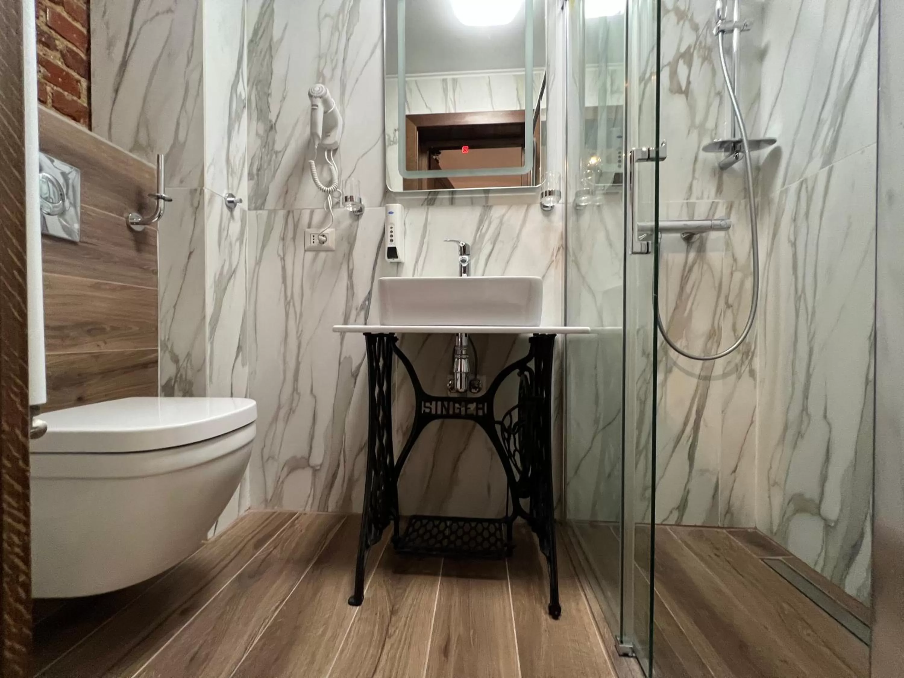 Shower in Hotel Boutique Cathedral Plaza Residences room for rent downtown