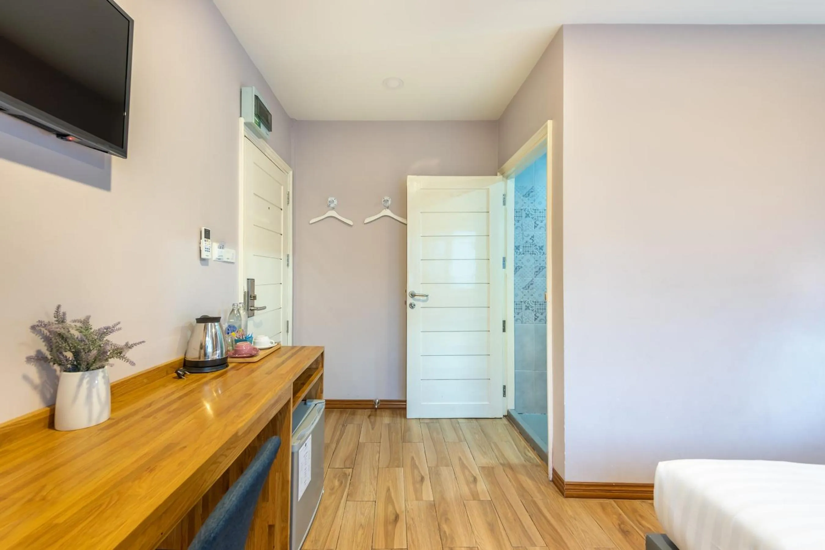 Bedroom in De Lavender Bangkok Hotel