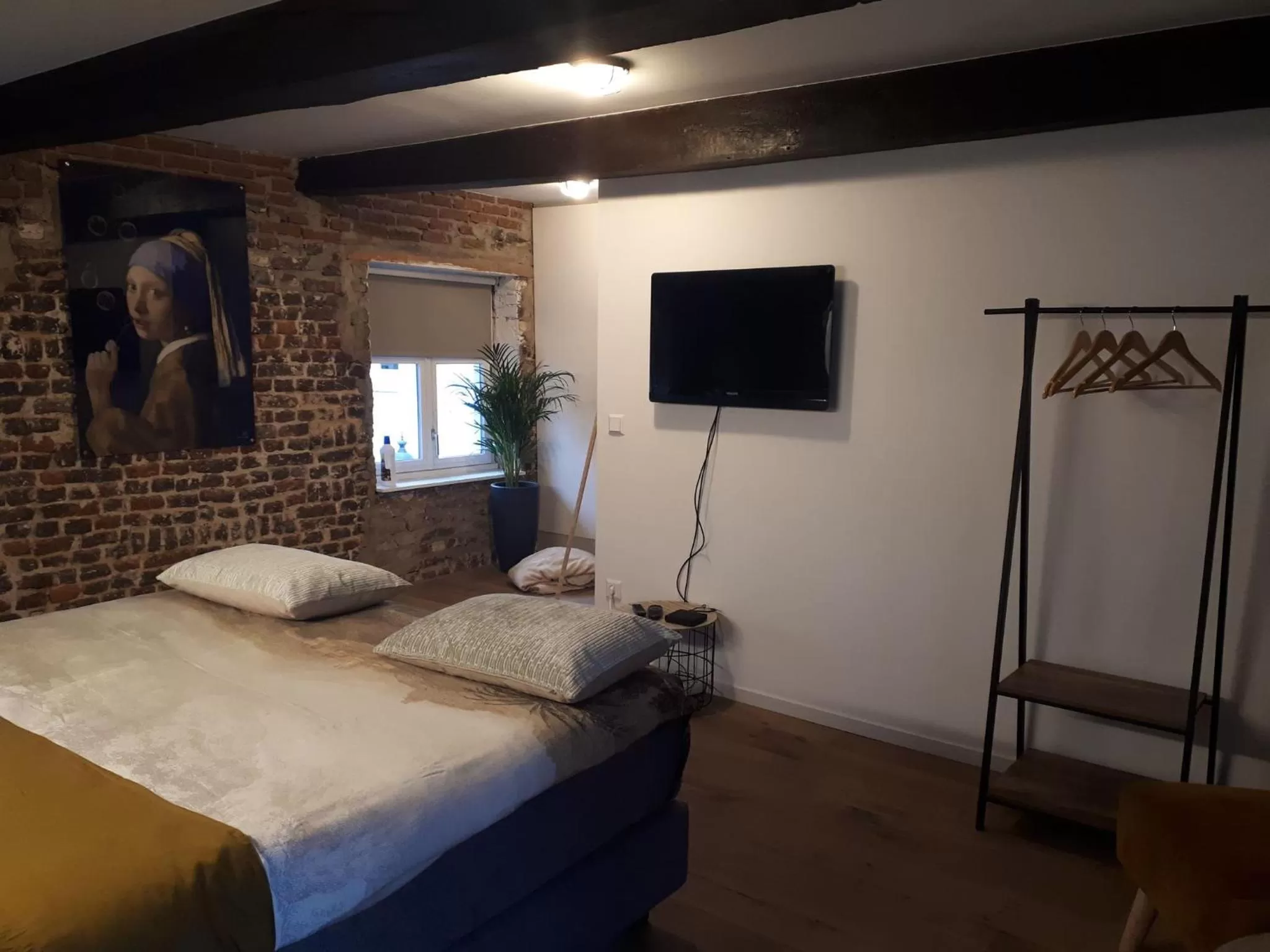 Bed in B&B Laeve in de Brouwerie