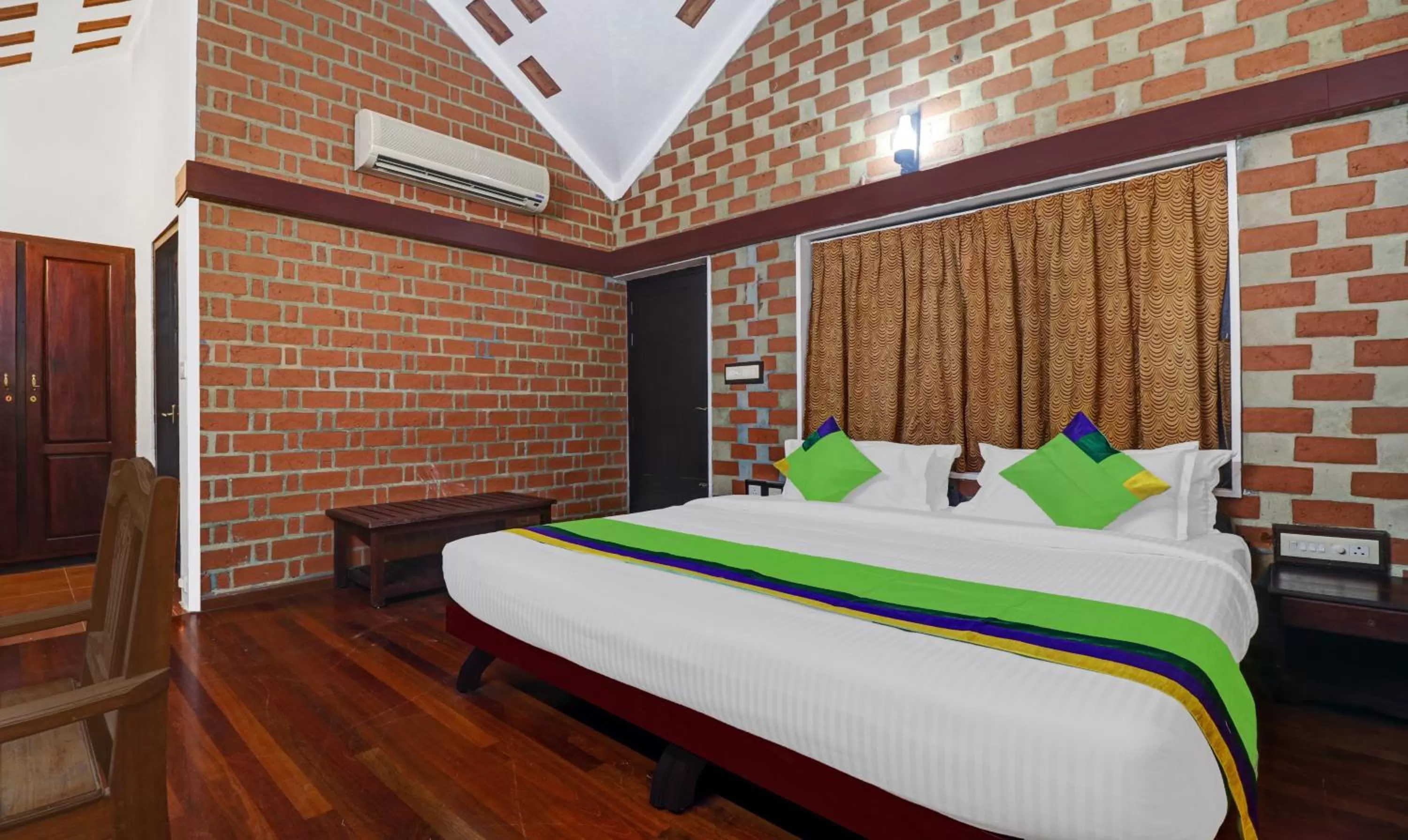 Bed in Treebo Trend God'S Own Country Ayurveda Resorts