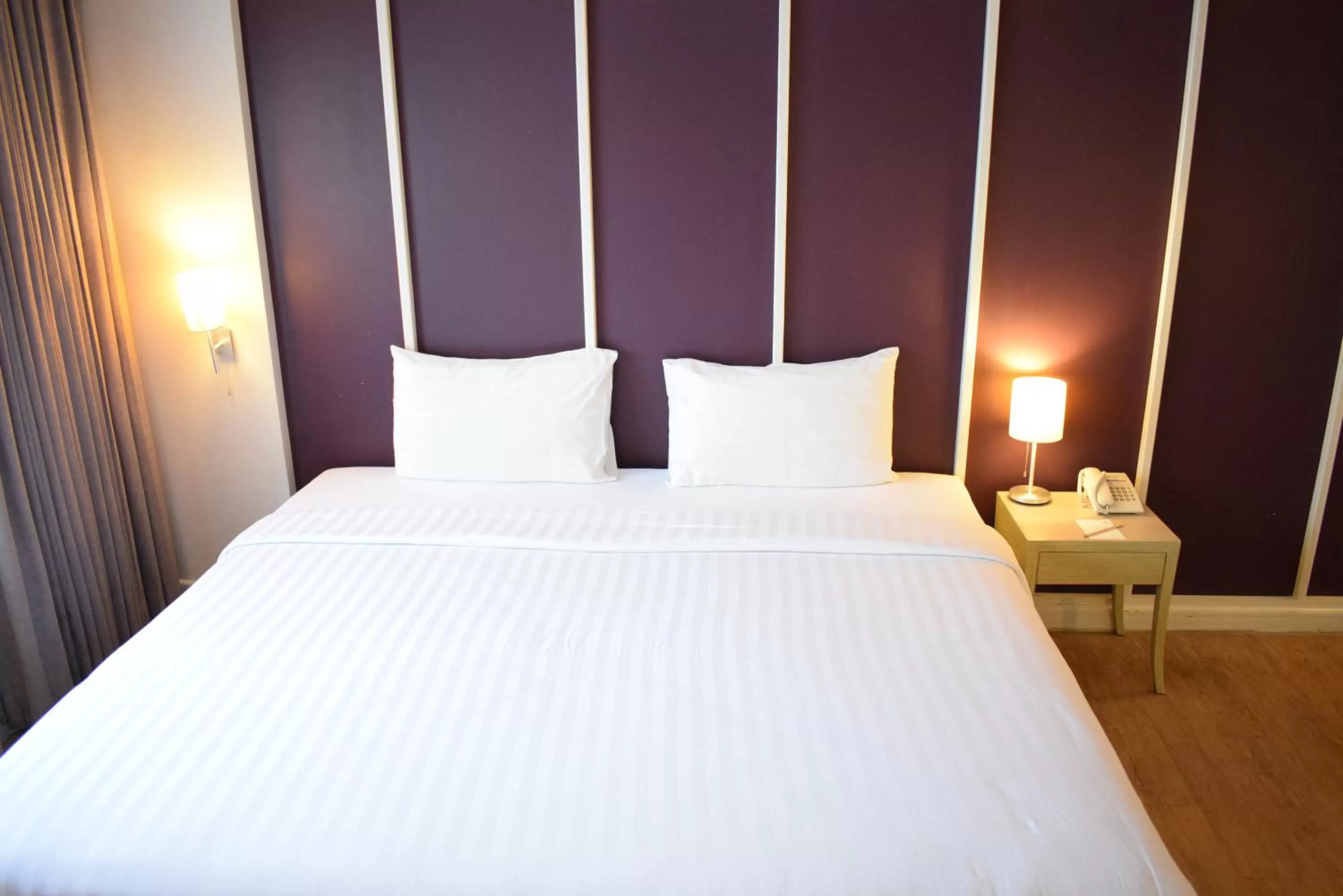 Bed in Trang Hotel Bangkok - SHA Plus