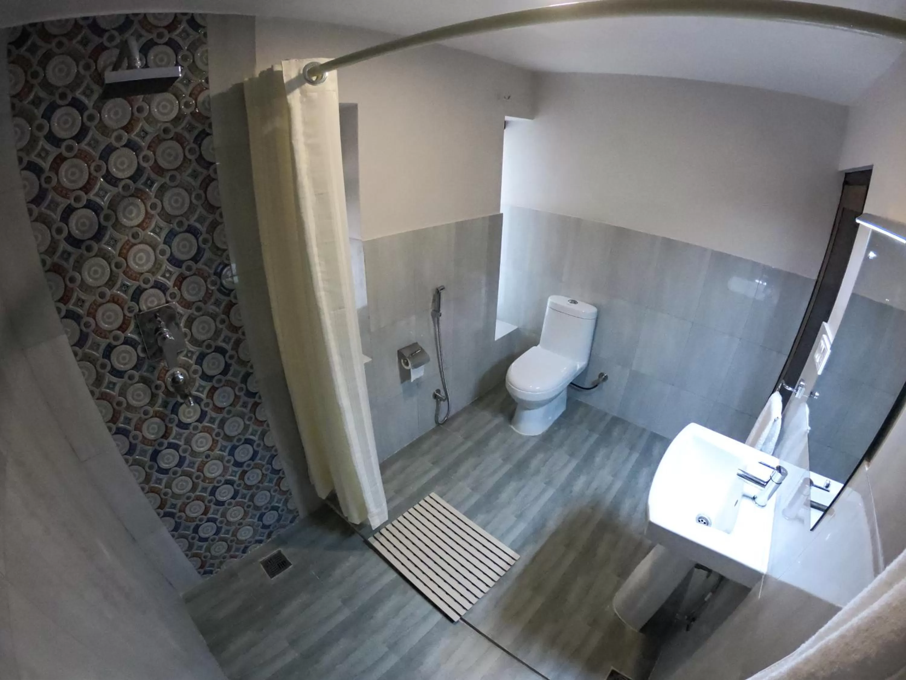 Bathroom in Omana Hotel