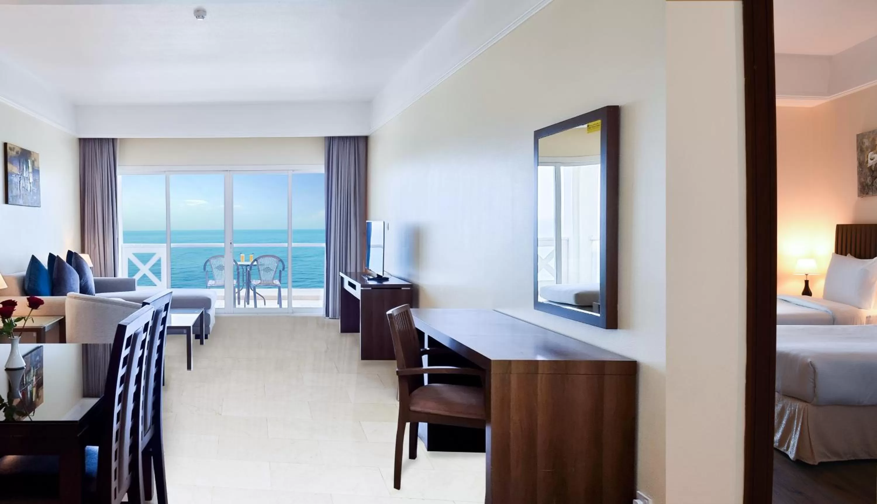 Balcony/Terrace, Bed in Ramada by Wyndham Beach Hotel Ajman