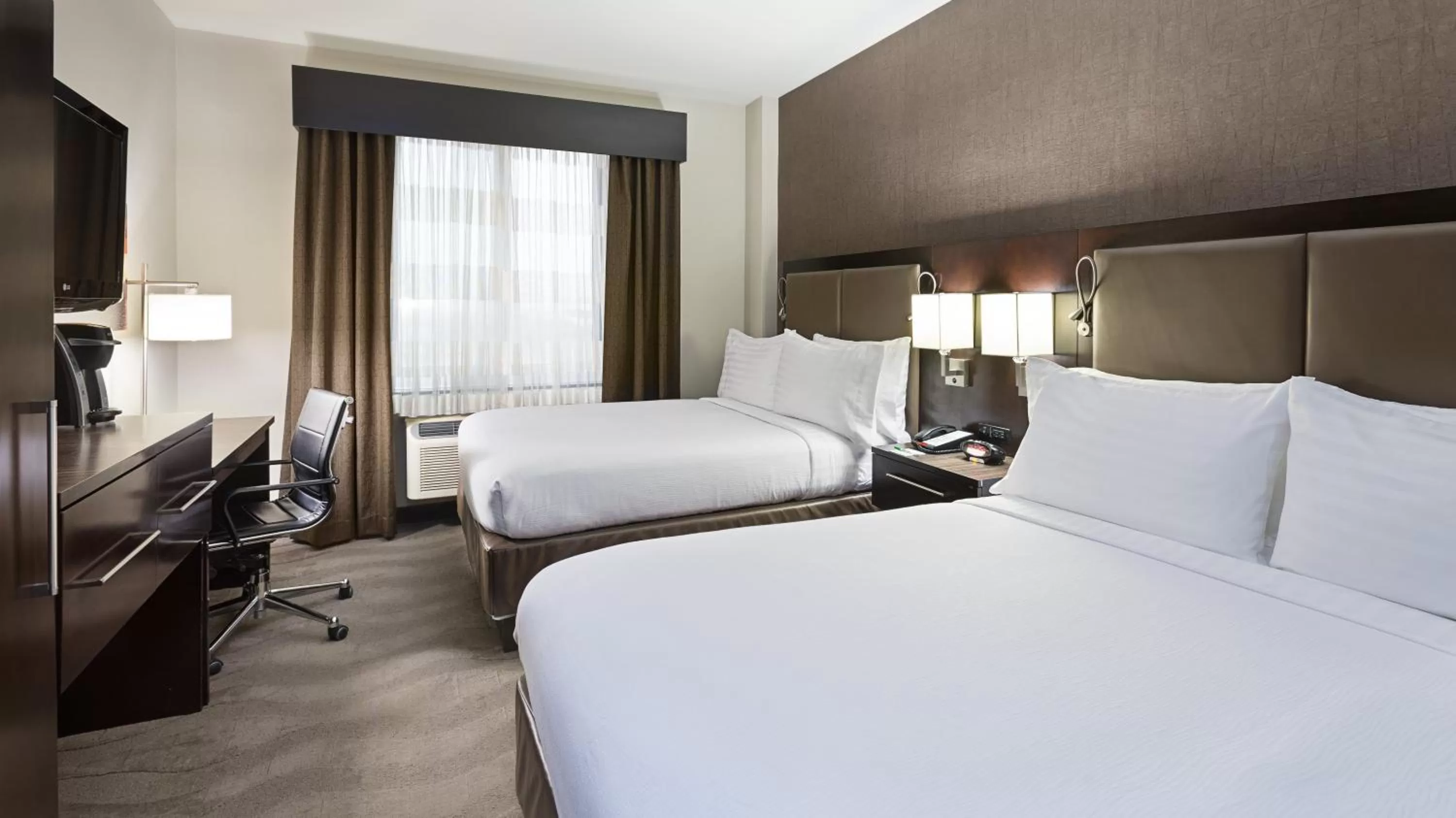 Photo of the whole room, Bed in Holiday Inn Lower East Side by IHG