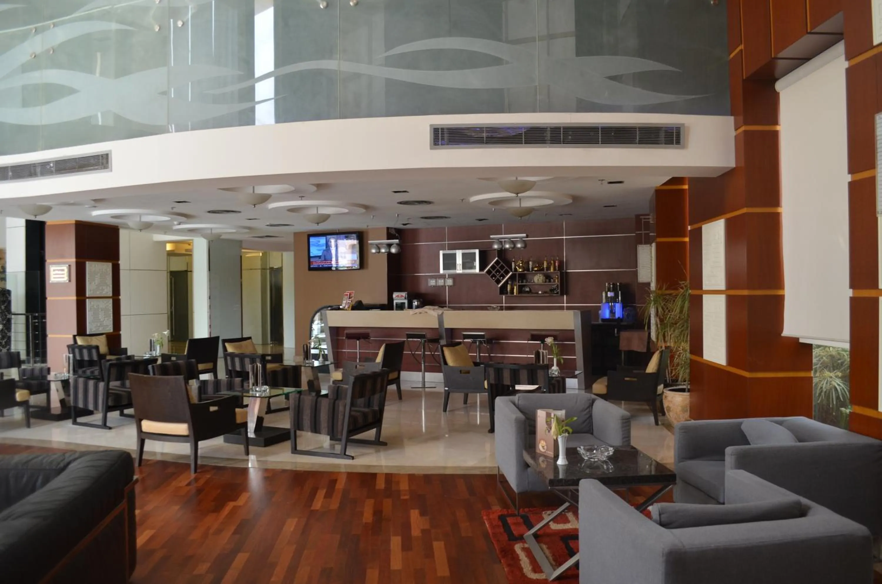 Lounge or bar in Eastyard Khobar Hotel - Formerly Ramada by Wyndham Khobar