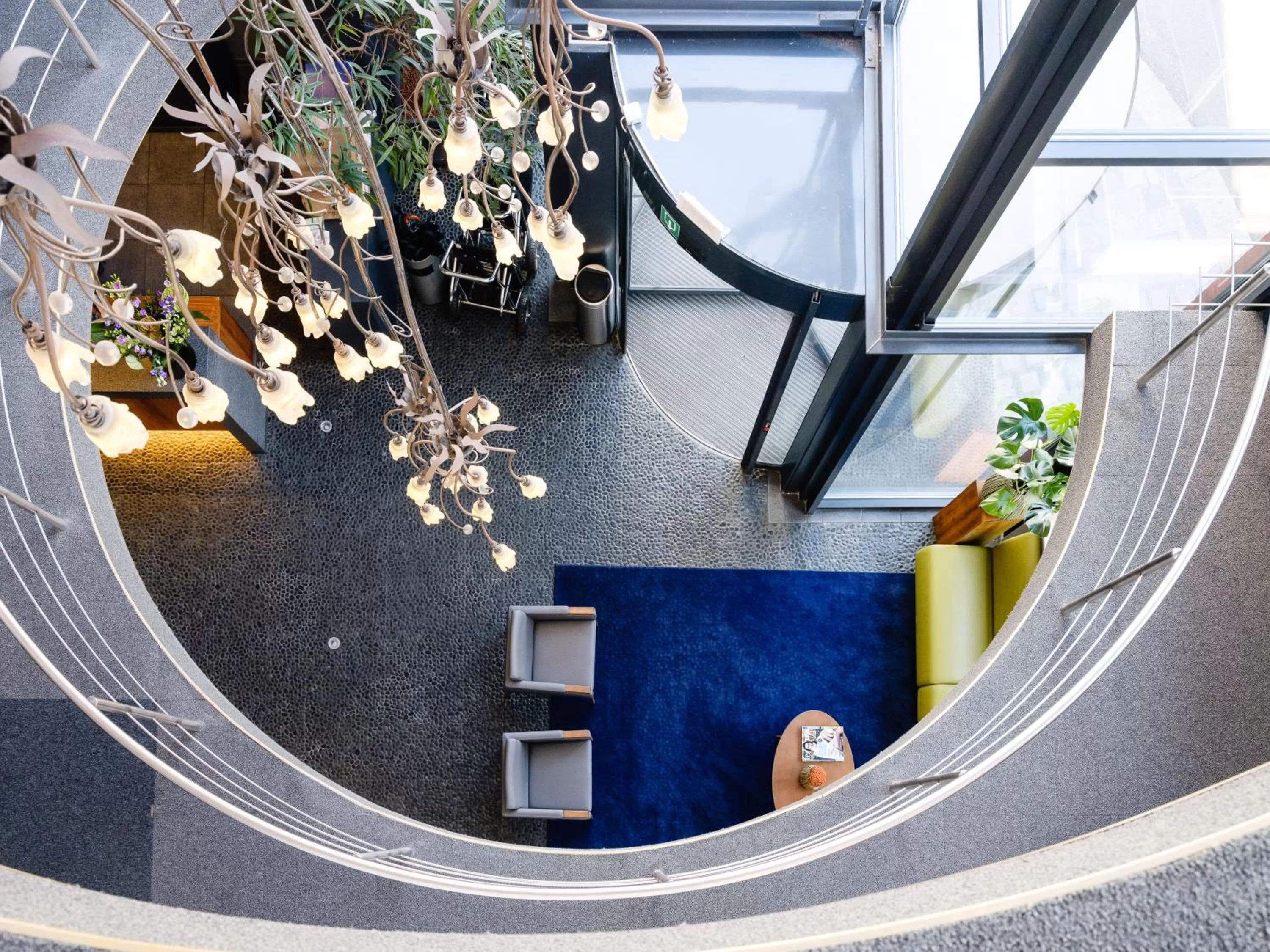 Communal lounge/ TV room in Ghent River Hotel