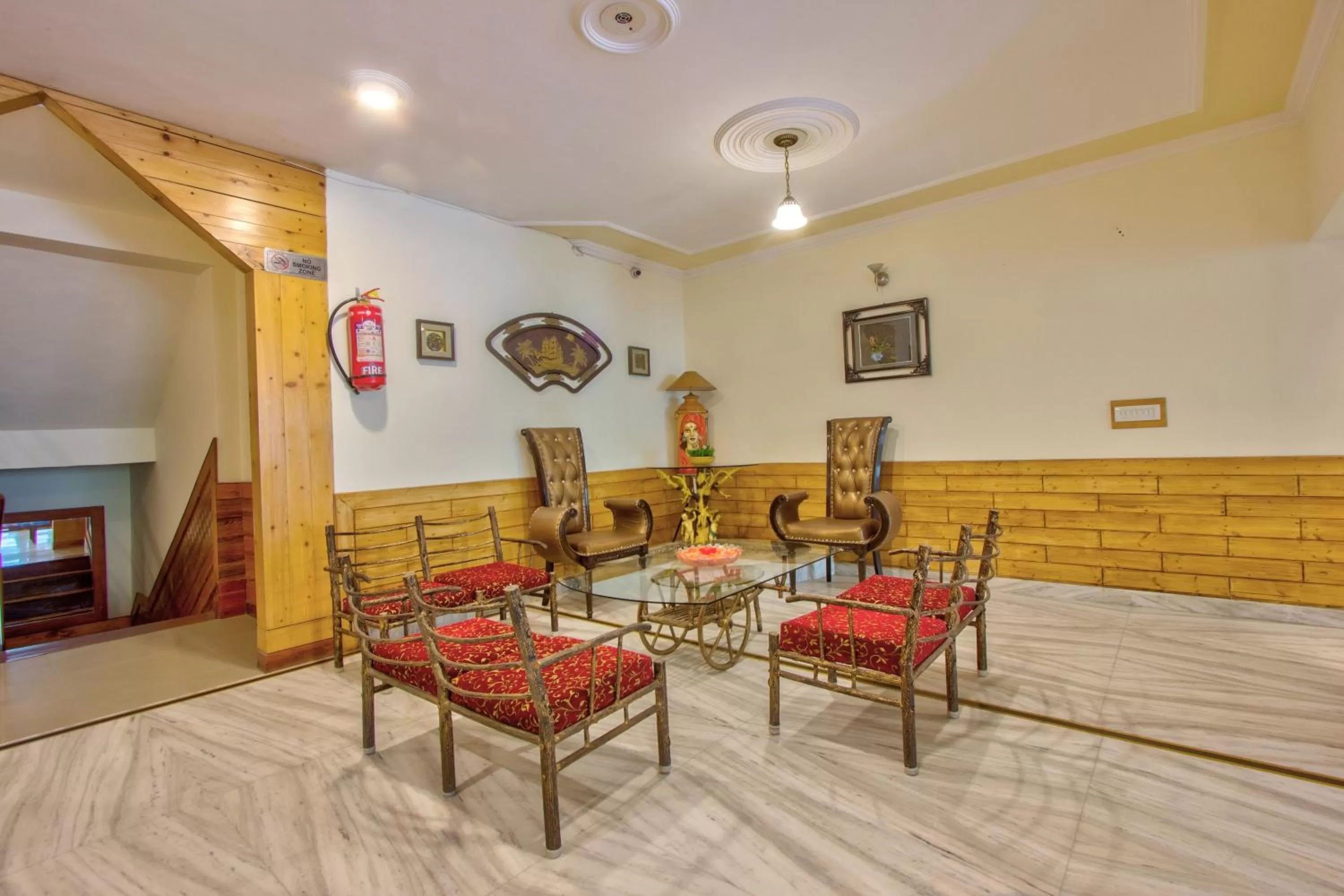 Seating area in Woodstock Inn Manali 800 Mtrs from Mall Road