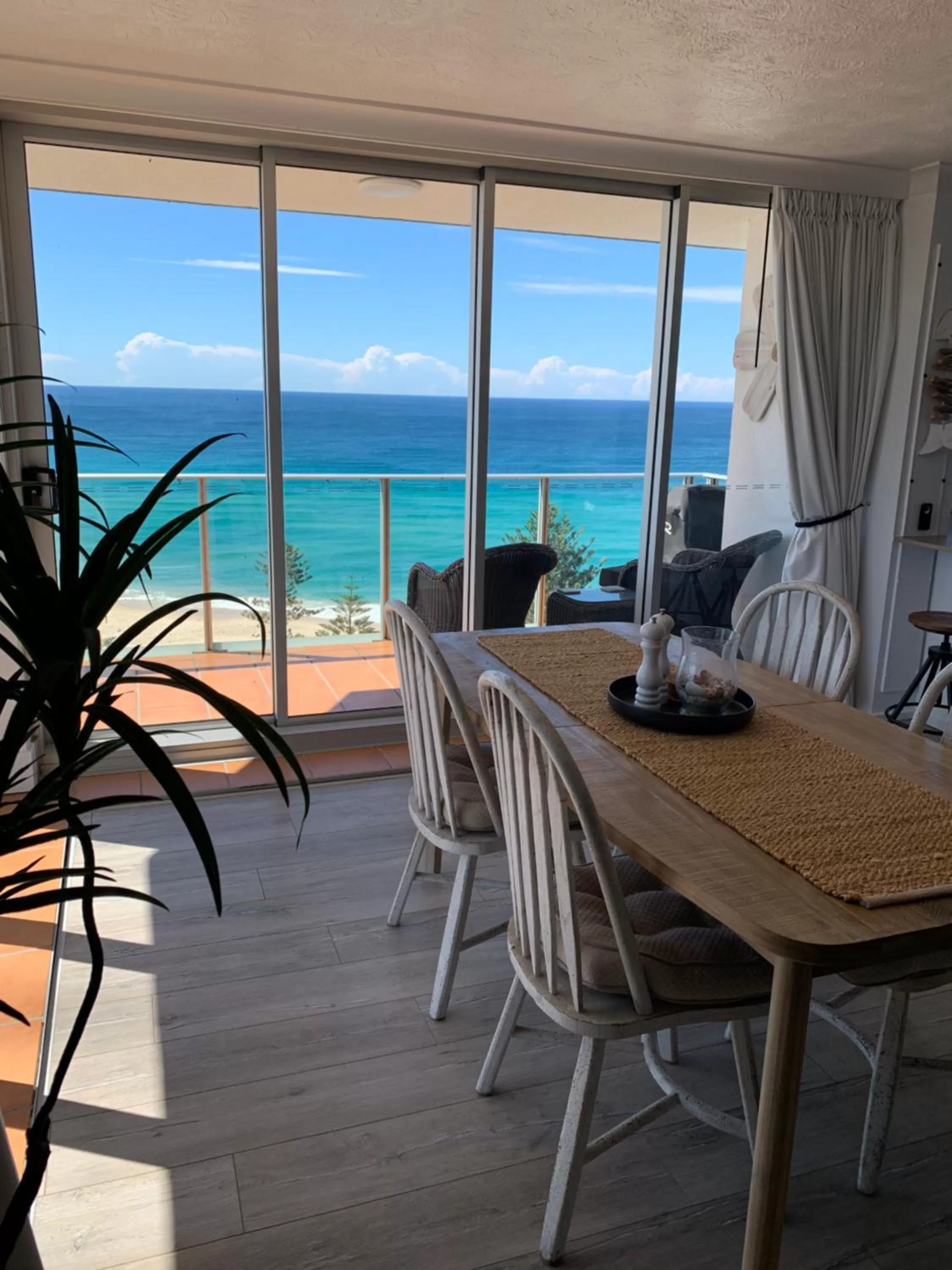 Dining area in Pacific Regis Beachfront Holiday Apartments