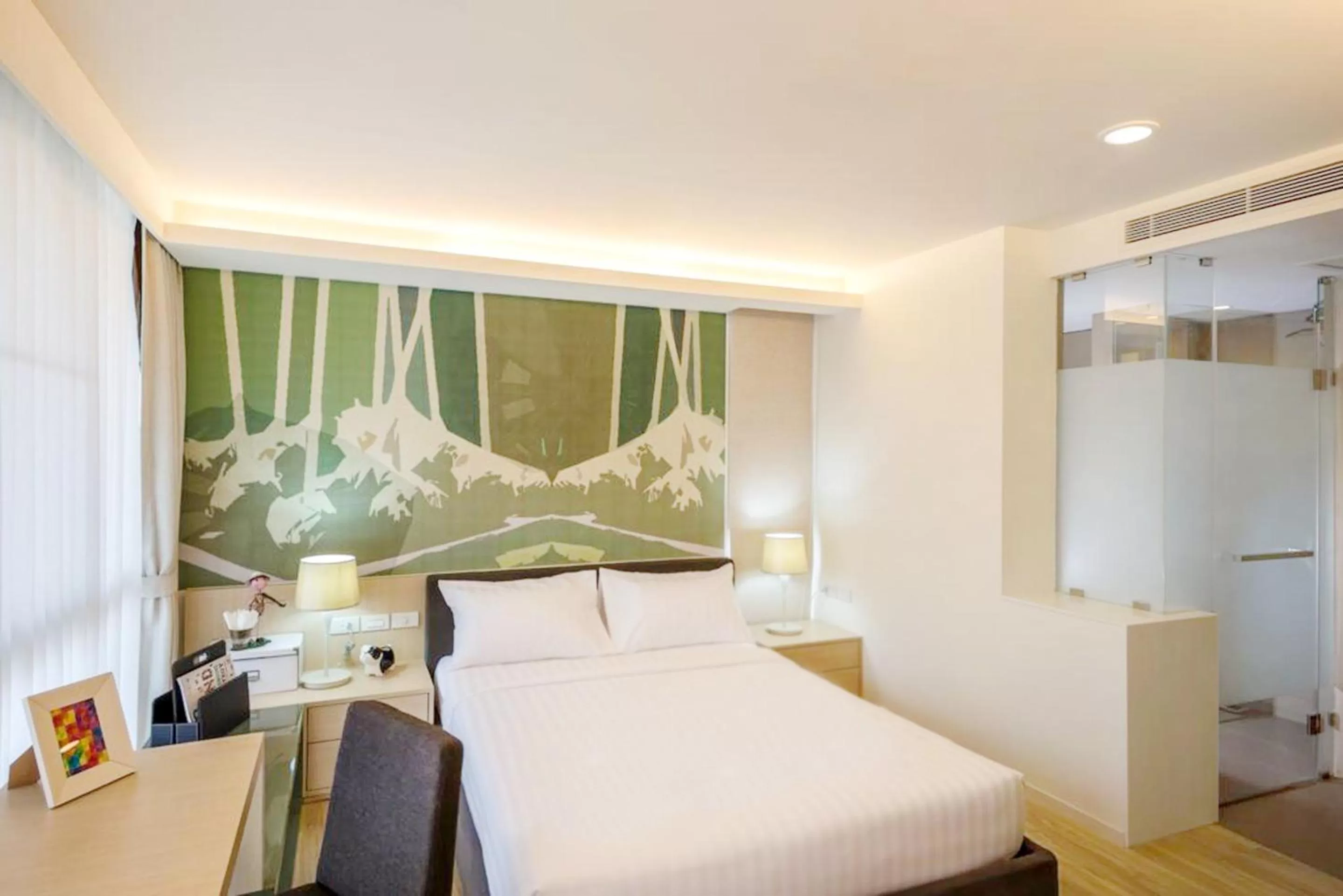 Bed in The Idle Hotel and Residence