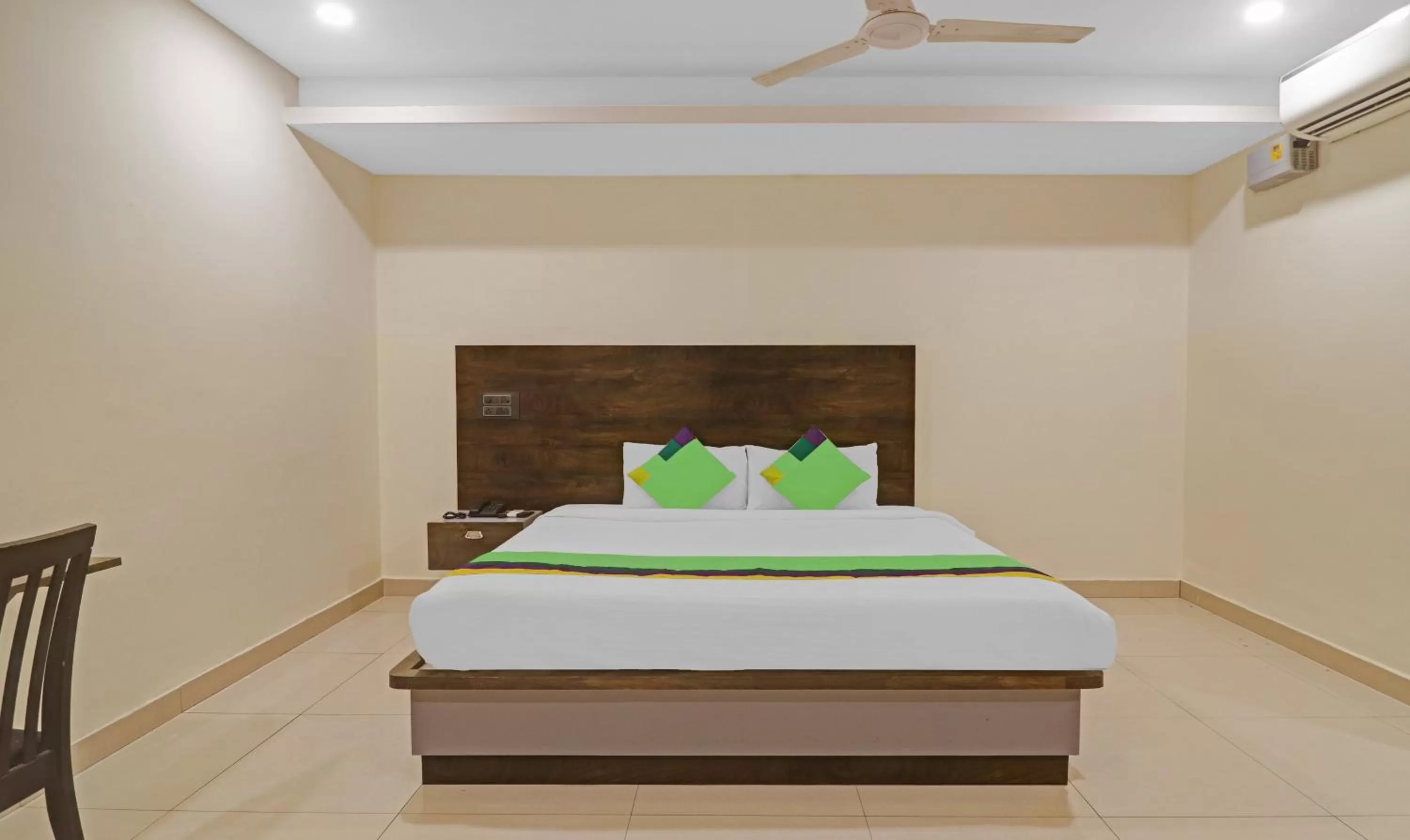 Bedroom, Bed in Treebo Trend Tee