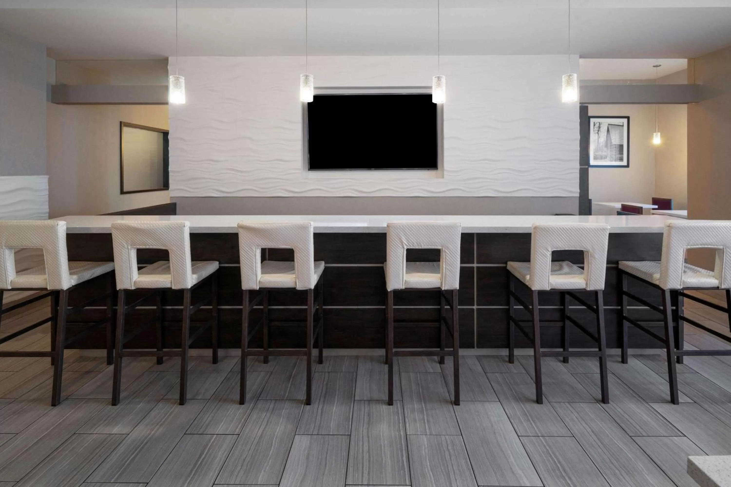 Communal lounge/ TV room in La Quinta by Wyndham Forsyth