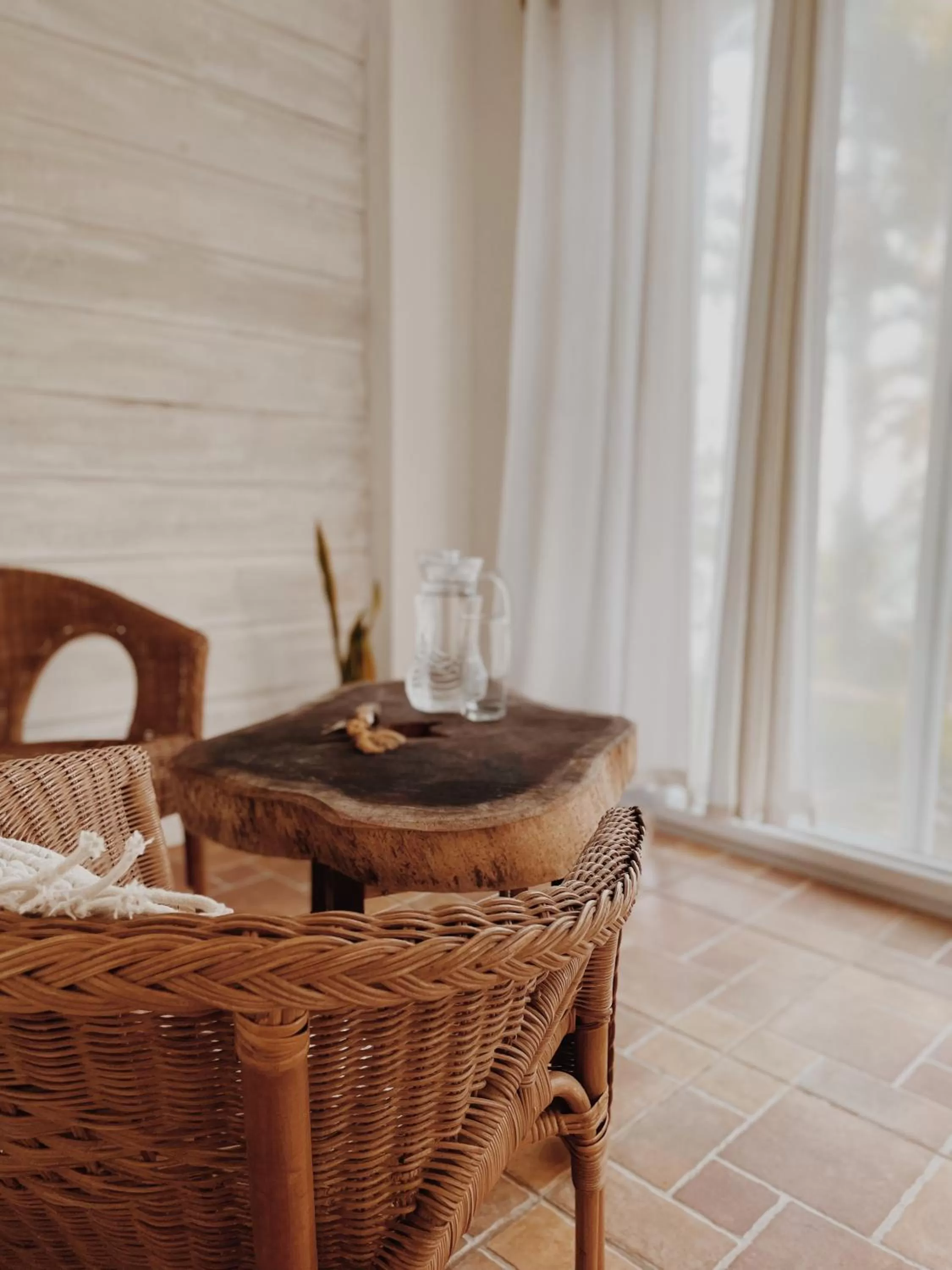 Seating area in Bird Island Bungalows
