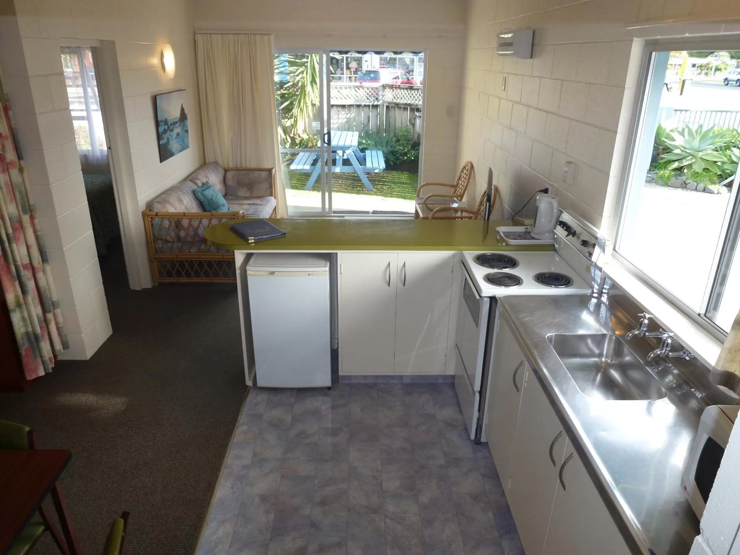 Photo of the whole room, Kitchen/Kitchenette in Mana-Nui Motel