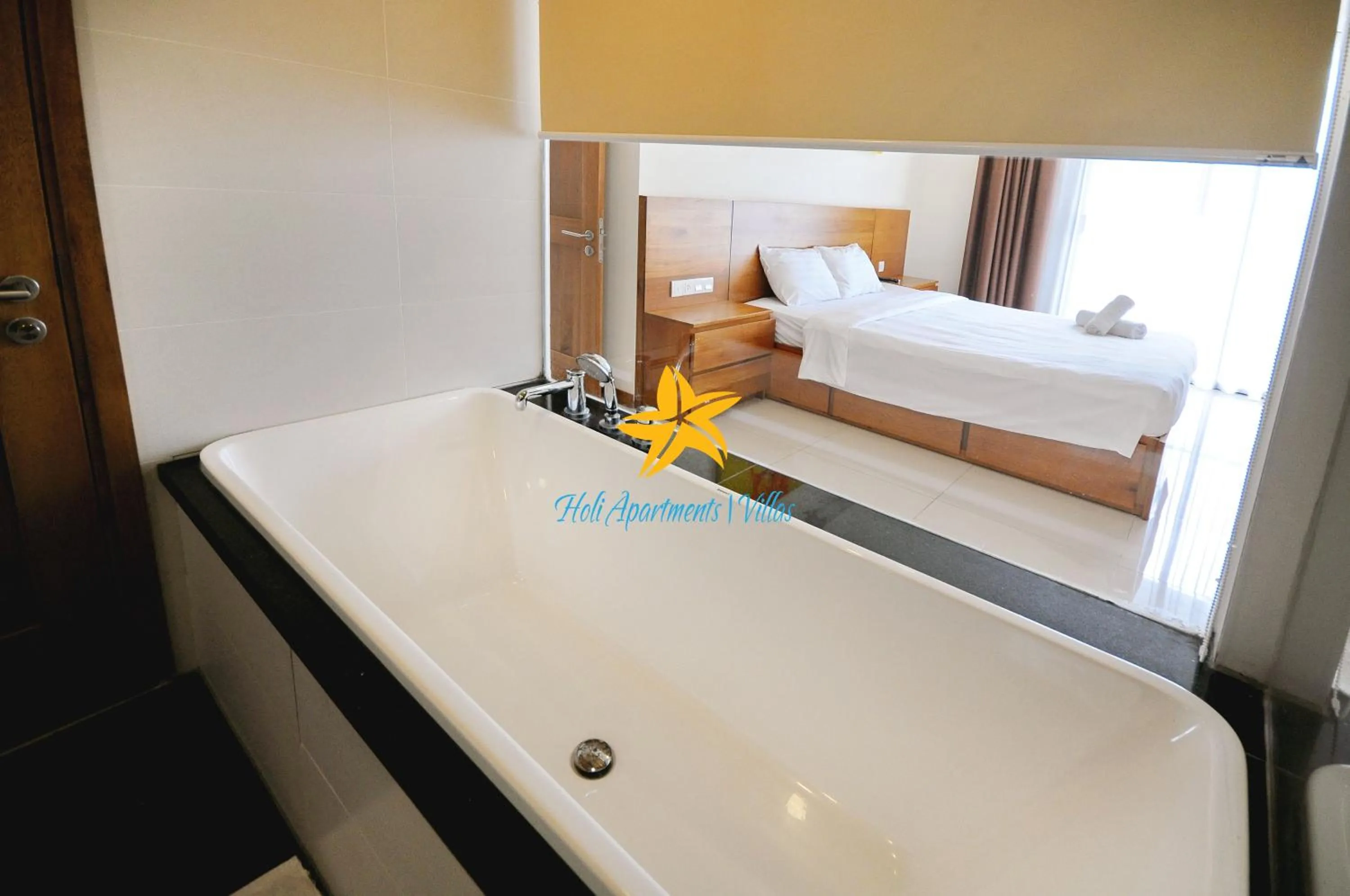 Bed in Holi Beach Hotel & Apartments