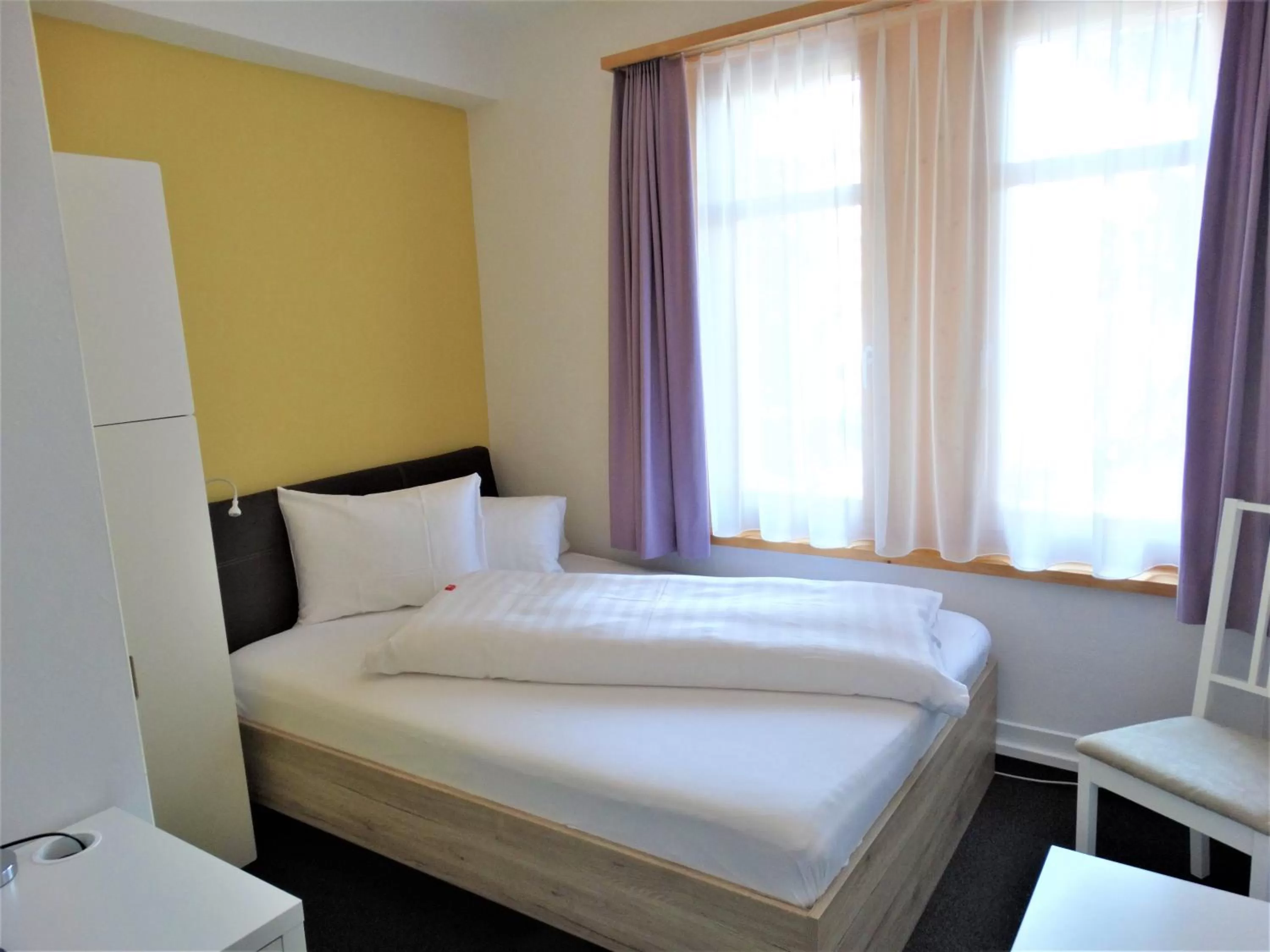 Bed in Hotel Bündnerhof