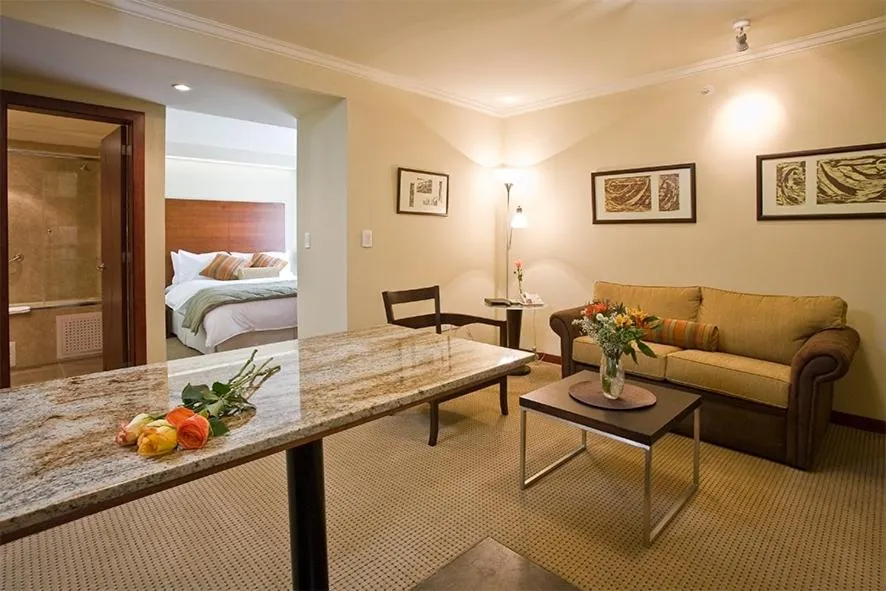 Photo of the whole room, Bed in Hotel Stubel Suites & Cafe