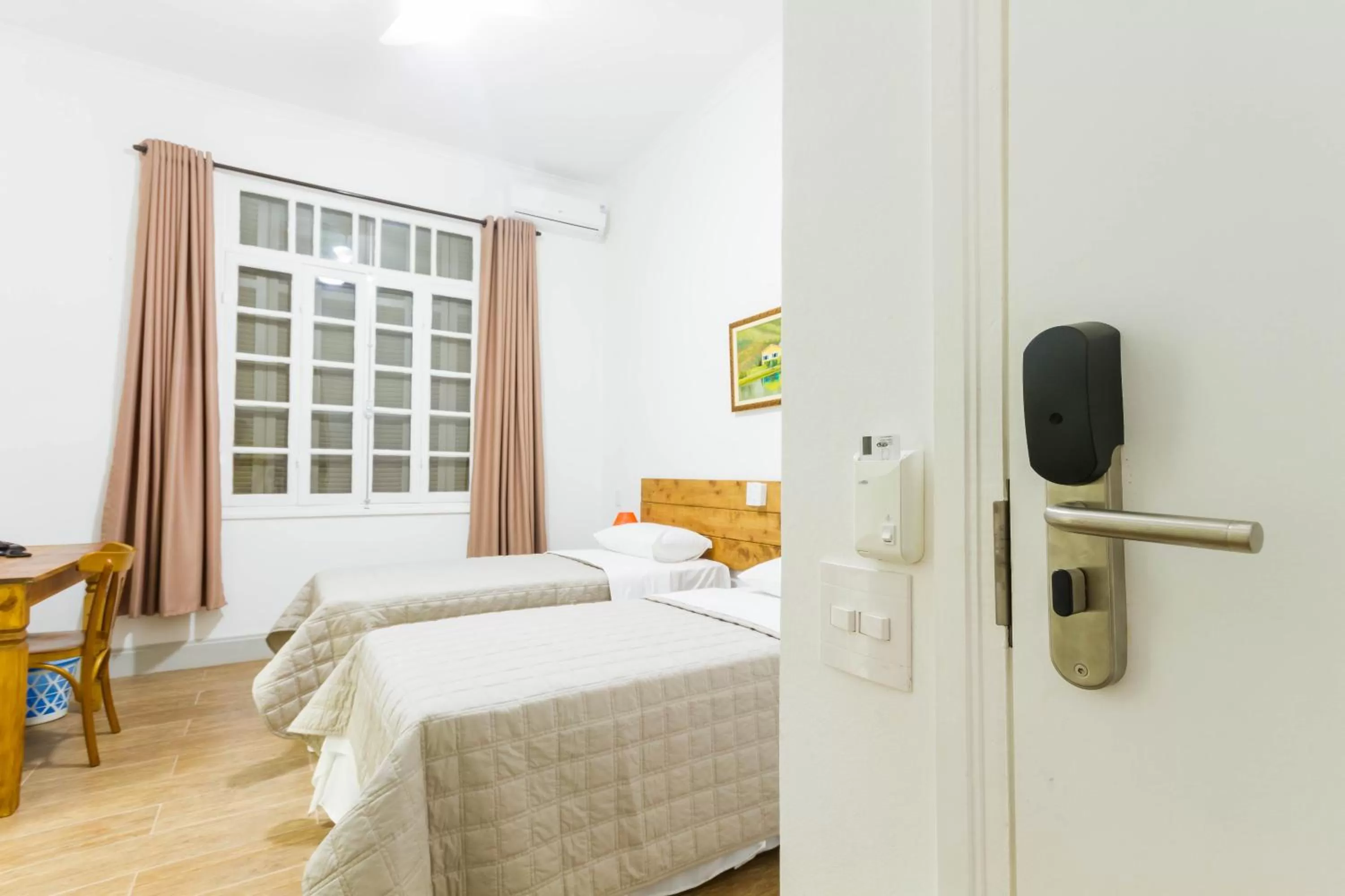 Bed in Pousada Sagrados Corações