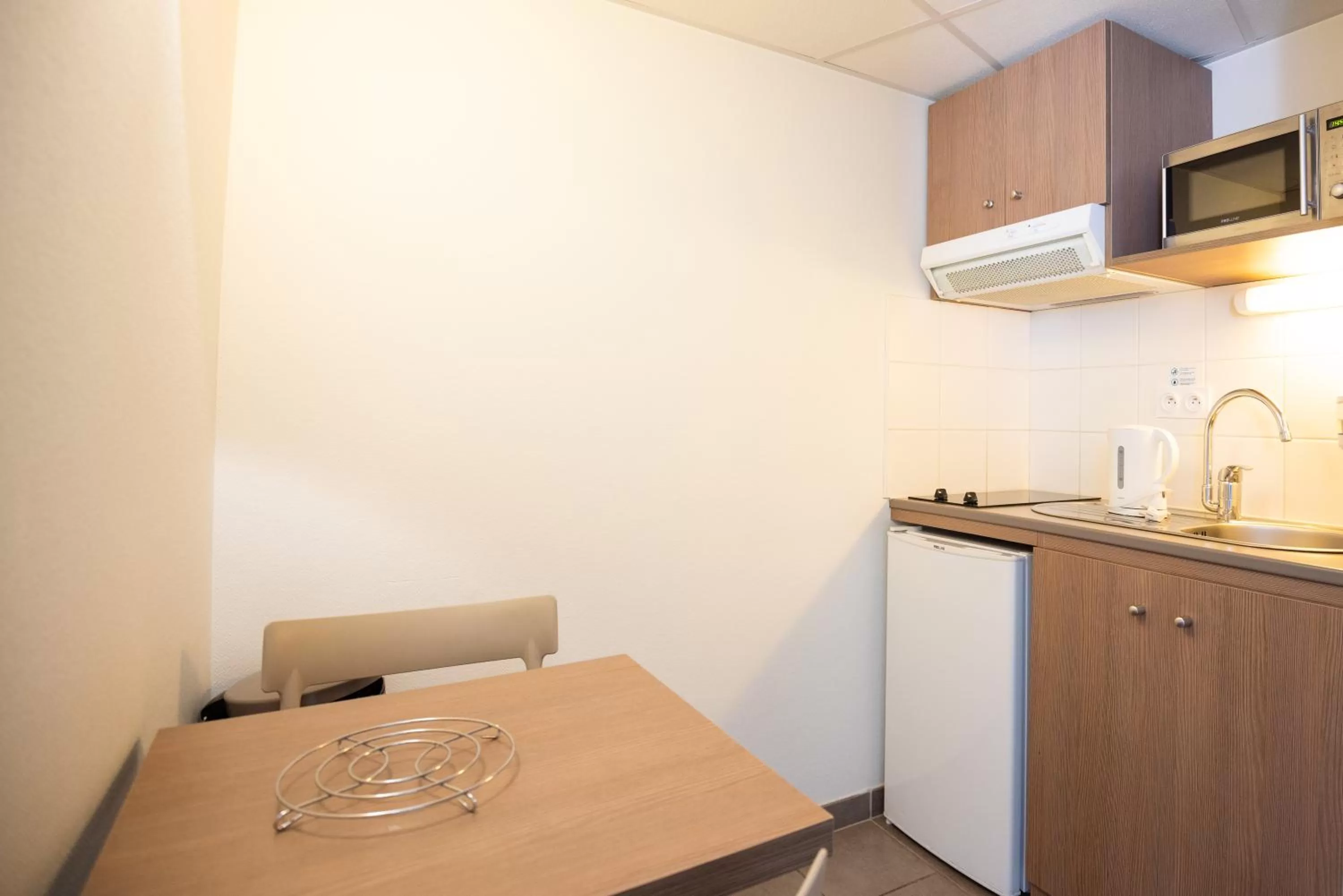 Kitchen or kitchenette in Zenitude Hôtel-Résidences Narbonne Centre