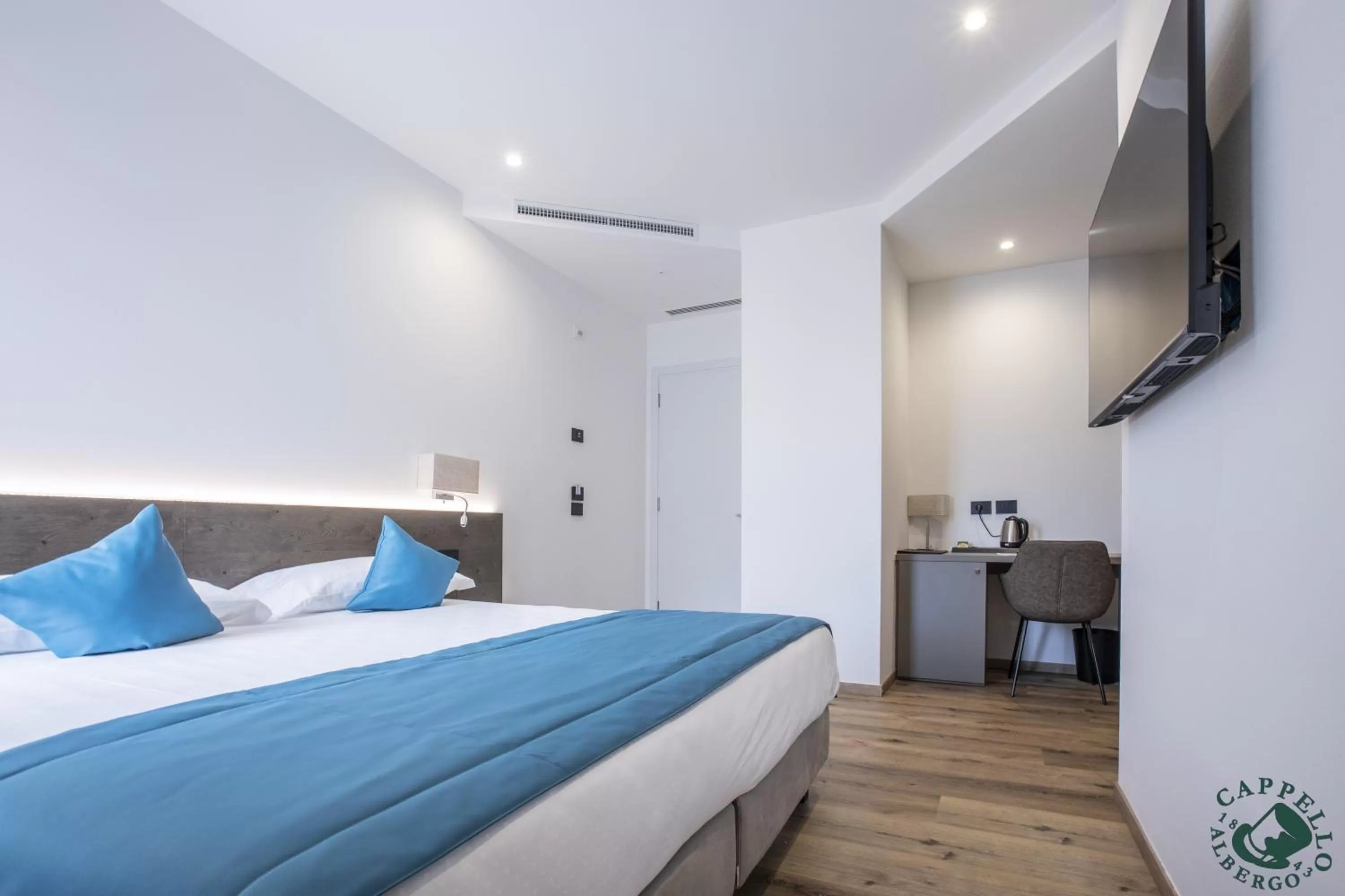 Bed in Albergo Cappello e Cadore