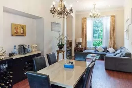 Dining area in Jane's private rooms with shared washroom