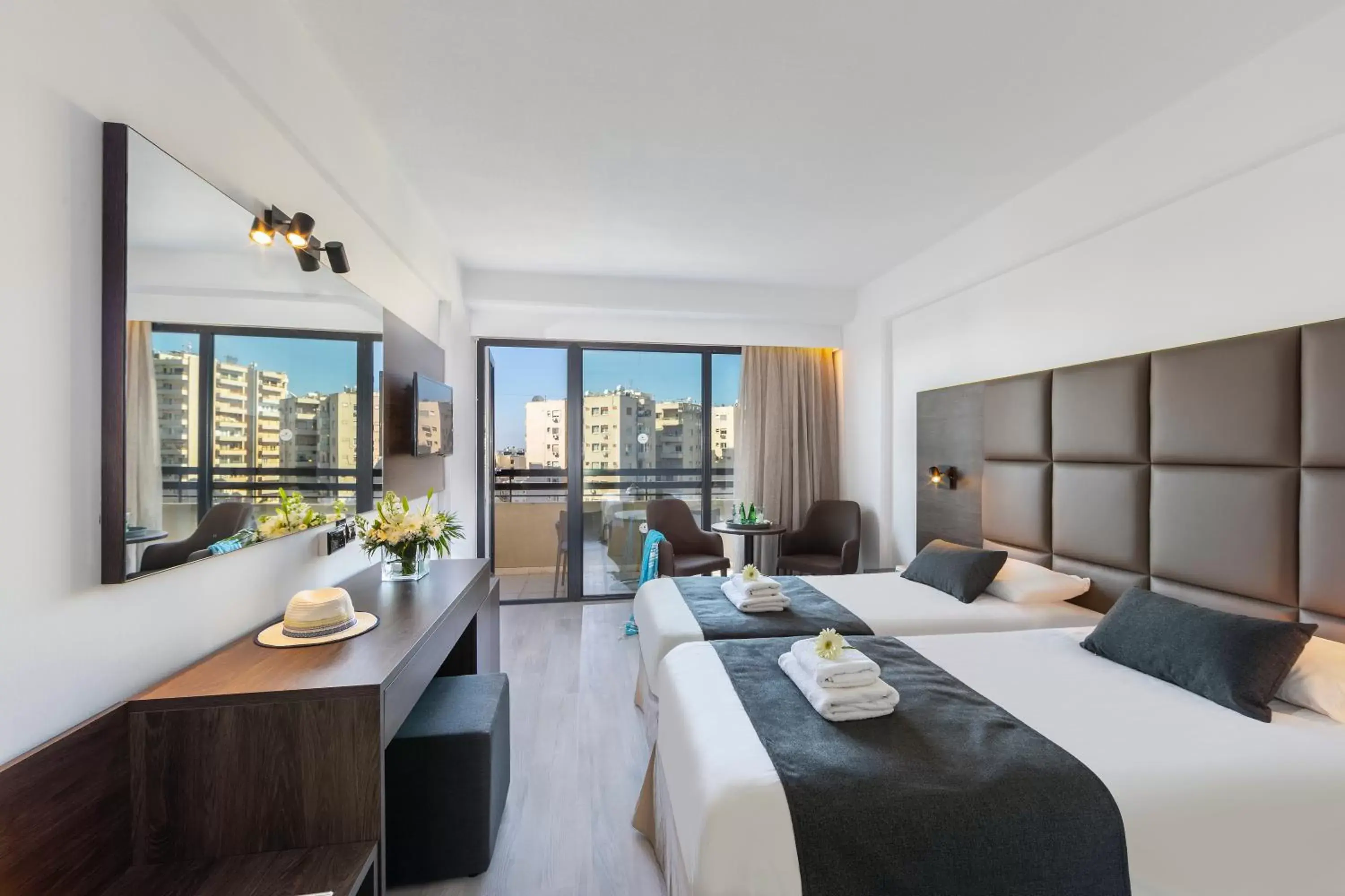 Deluxe Double/Twin Room with Limited Sea View (2 Adults + 1 Child) in Odysseia Hotel Kapetanios Deluxe Double/Twin Room with Limited Sea View (2 Adults + 1 Child) in Odysseia Hotel Kapetanios