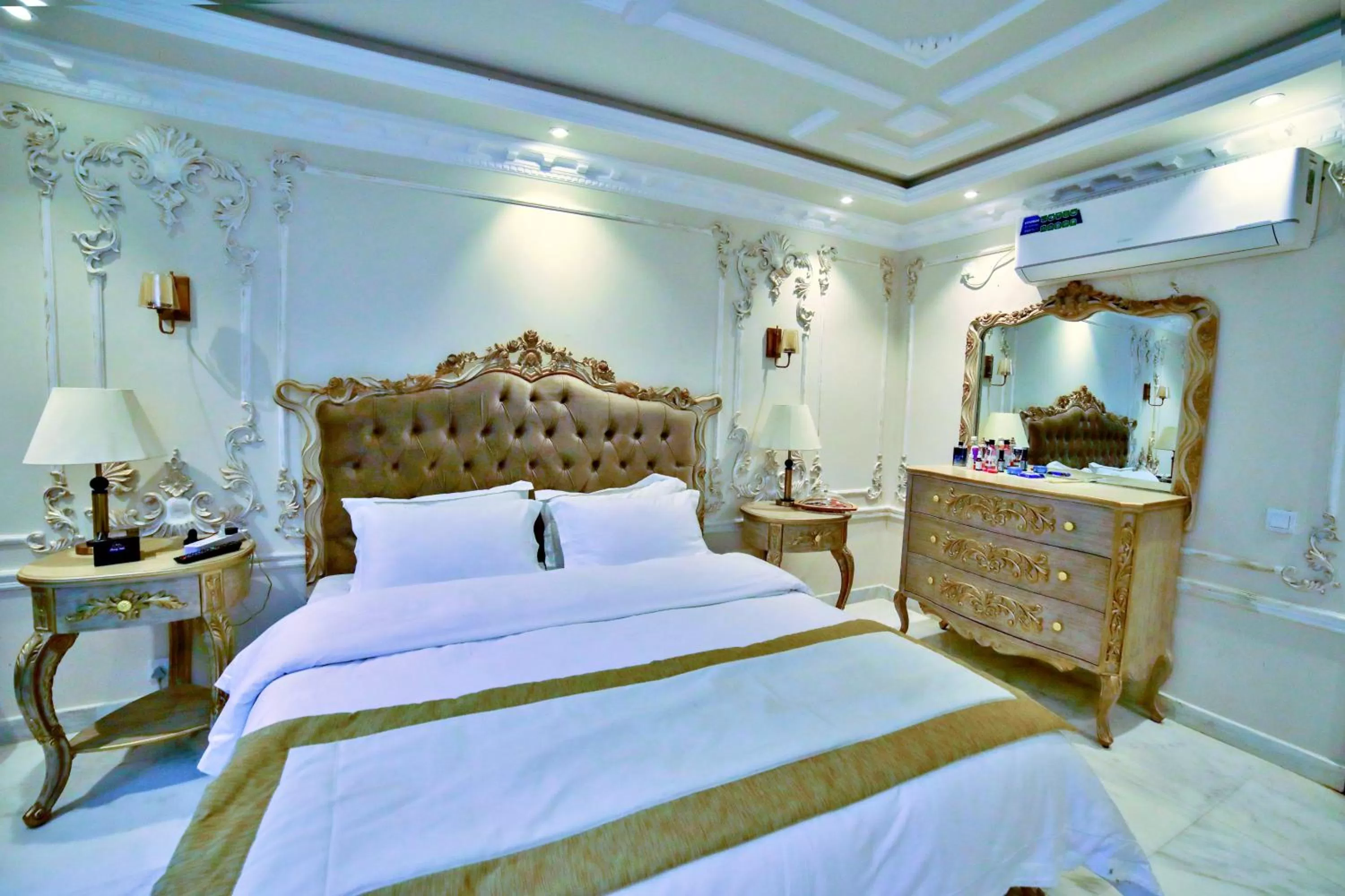 Bed in Arish Luxury Suites