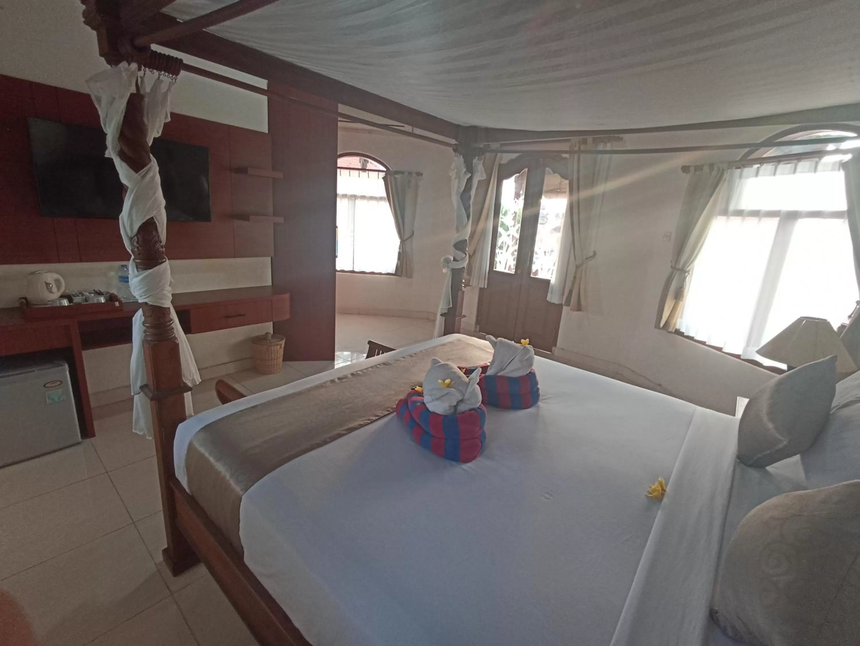 Bed in Kusnadi Hotel